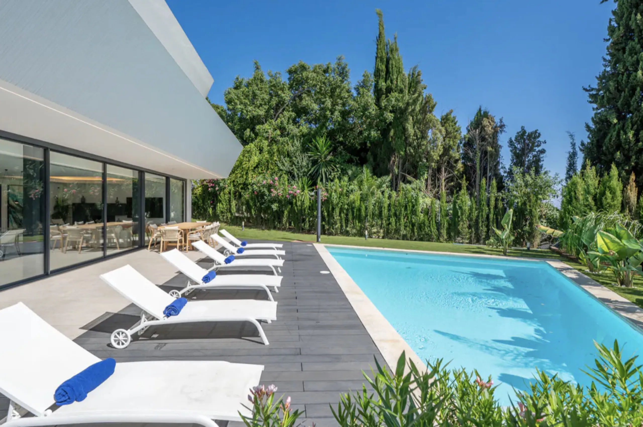 This stunning property is a modern luxury home in Reserva Marbella with open sea views and a bright open-plan design. The ground floor connects the kitchen, dining and living areas in one clean space that leads to a covered terrace, a landscaped garden an