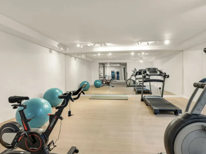 This stunning property is a modern luxury home in Reserva Marbella with open sea views and a bright open-plan design. The ground floor connects the kitchen, dining and living areas in one clean space that leads to a covered terrace, a landscaped garden an