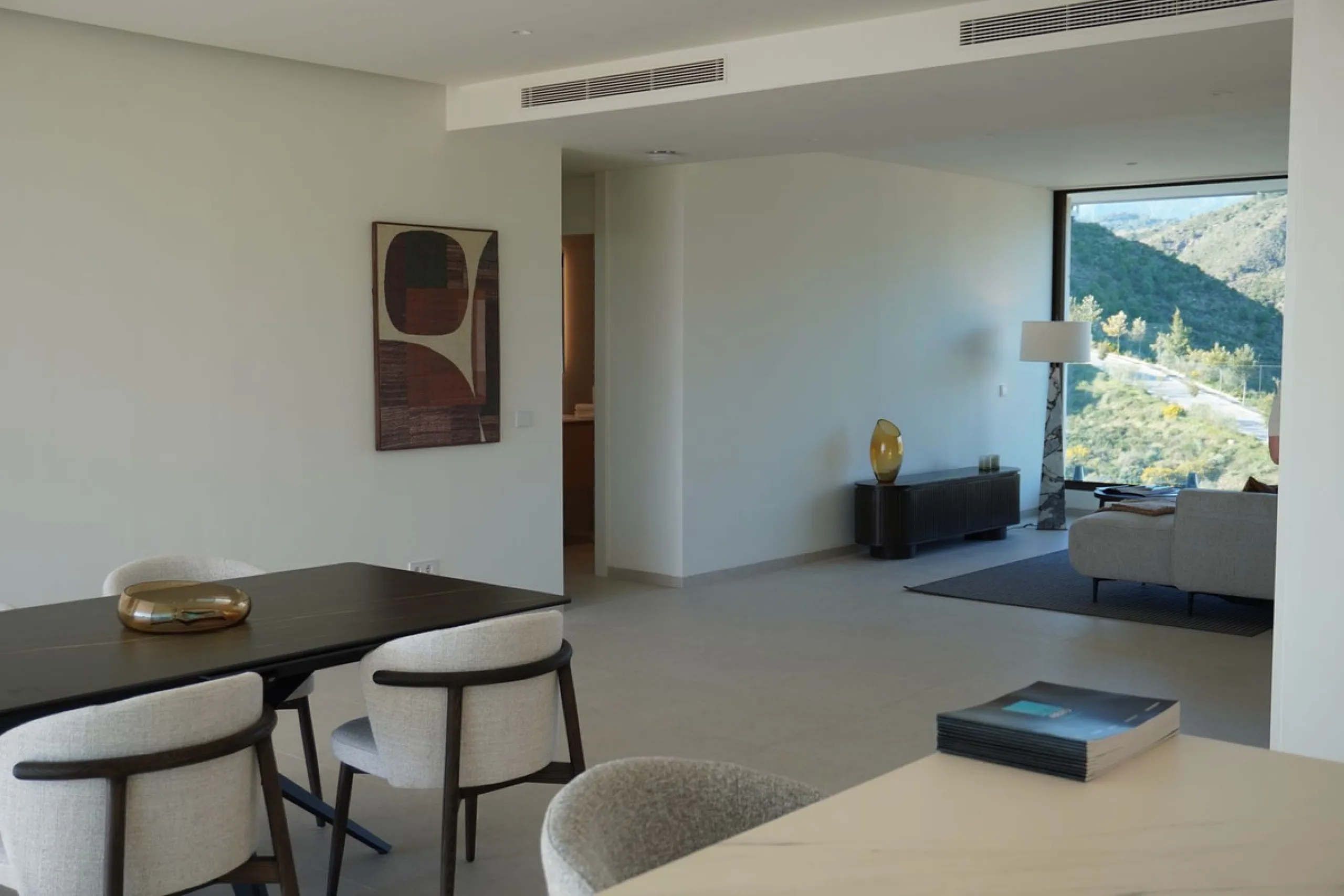 Discover a rare opportunity to own one of the very few 4-bedroom residences in the prestigious Palmitos development, La Quinta. This stunning apartment offers a spacious living room, fully equipped designer kitchen, four bedrooms, two bathrooms, and a gue