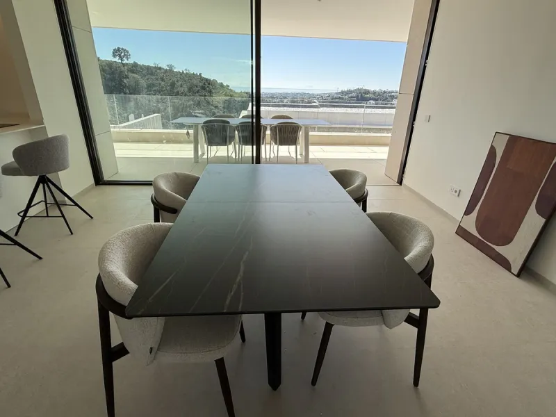 Discover a rare opportunity to own one of the very few 4-bedroom residences in the prestigious Palmitos development, La Quinta. This stunning apartment offers a spacious living room, fully equipped designer kitchen, four bedrooms, two bathrooms, and a gue