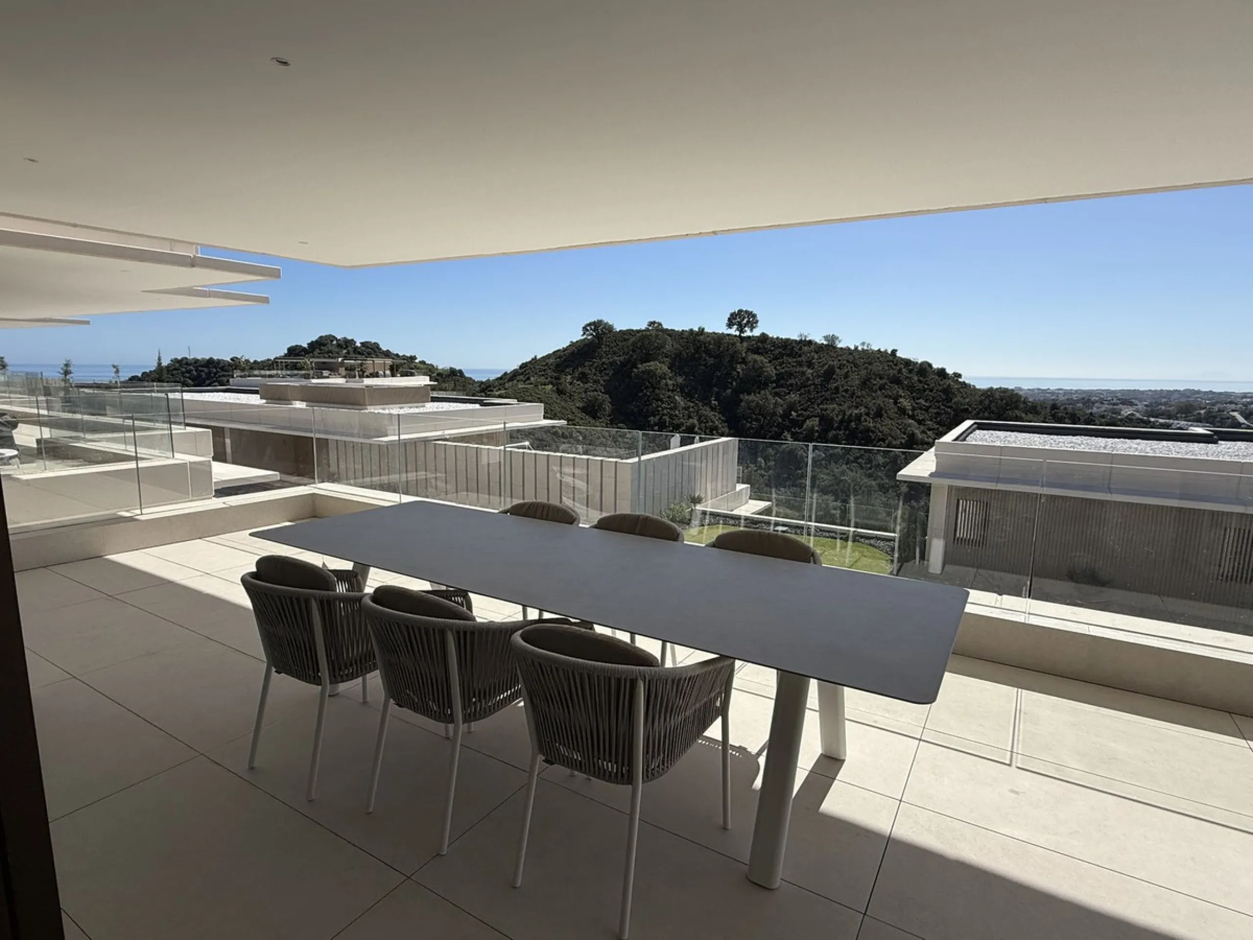 Discover a rare opportunity to own one of the very few 4-bedroom residences in the prestigious Palmitos development, La Quinta. This stunning apartment offers a spacious living room, fully equipped designer kitchen, four bedrooms, two bathrooms, and a gue