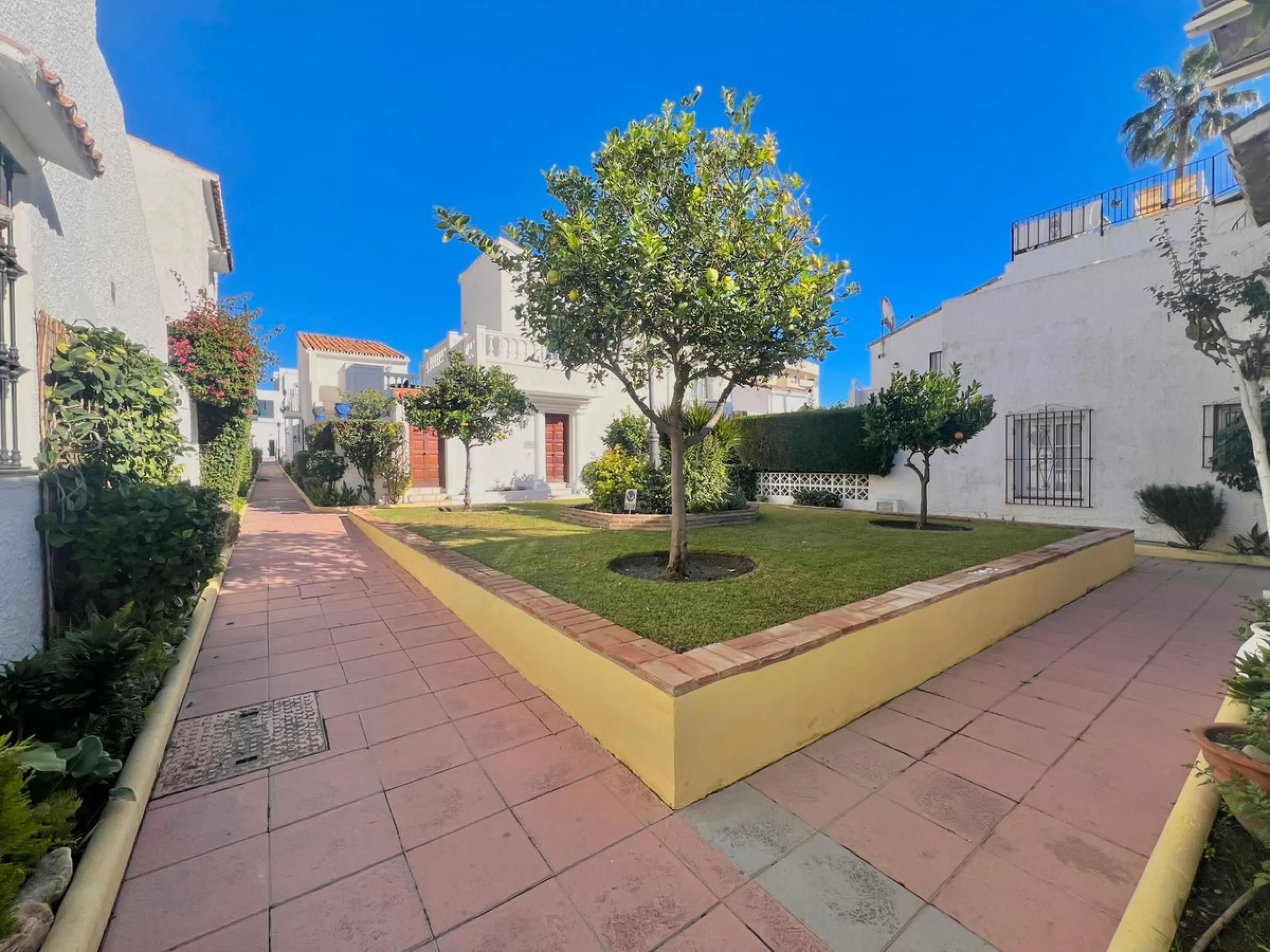 Beachfront complex in Estepona, New Golden Mile, between Cancelada and Selwo, close to Las Dunas. Stunning fully renovated corner semi-detached townhouse, located in a frontline beach complex with a unique charm, reminiscent of an authentic fishing villag