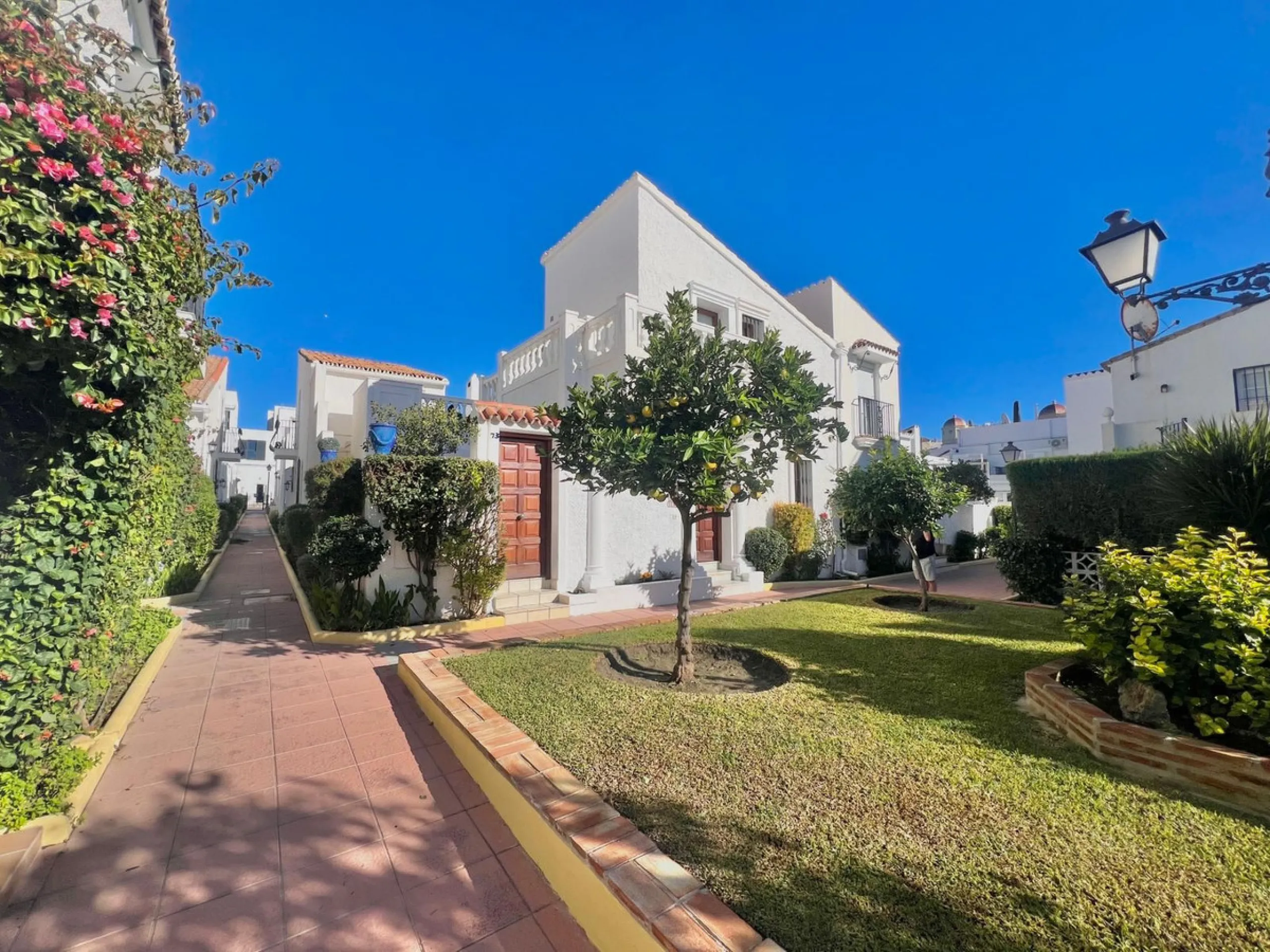 Beachfront complex in Estepona, New Golden Mile, between Cancelada and Selwo, close to Las Dunas. Stunning fully renovated corner semi-detached townhouse, located in a frontline beach complex with a unique charm, reminiscent of an authentic fishing villag