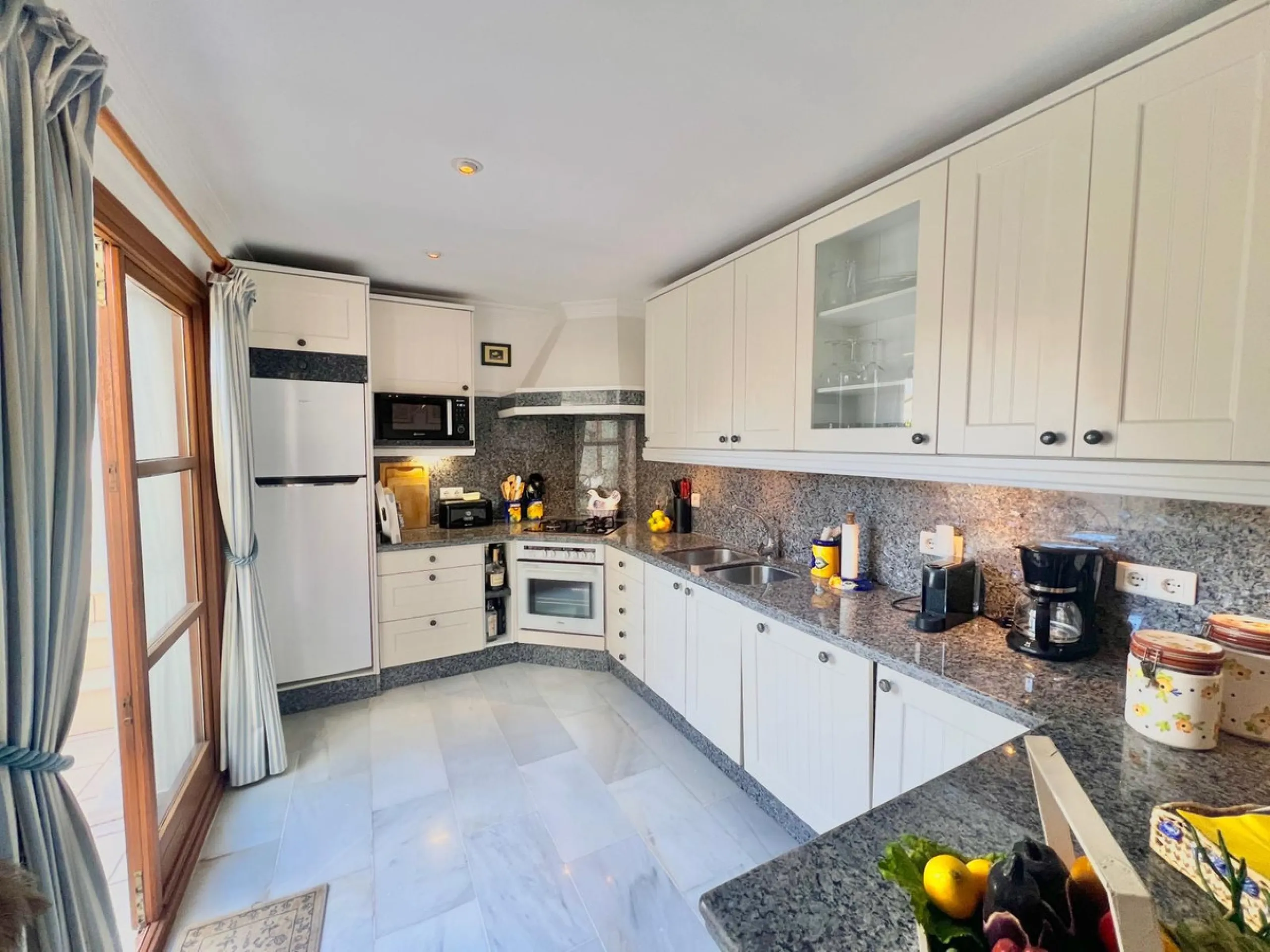 Beachfront complex in Estepona, New Golden Mile, between Cancelada and Selwo, close to Las Dunas. Stunning fully renovated corner semi-detached townhouse, located in a frontline beach complex with a unique charm, reminiscent of an authentic fishing villag