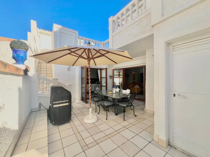 Beachfront complex in Estepona, New Golden Mile, between Cancelada and Selwo, close to Las Dunas. Stunning fully renovated corner semi-detached townhouse, located in a frontline beach complex with a unique charm, reminiscent of an authentic fishing villag