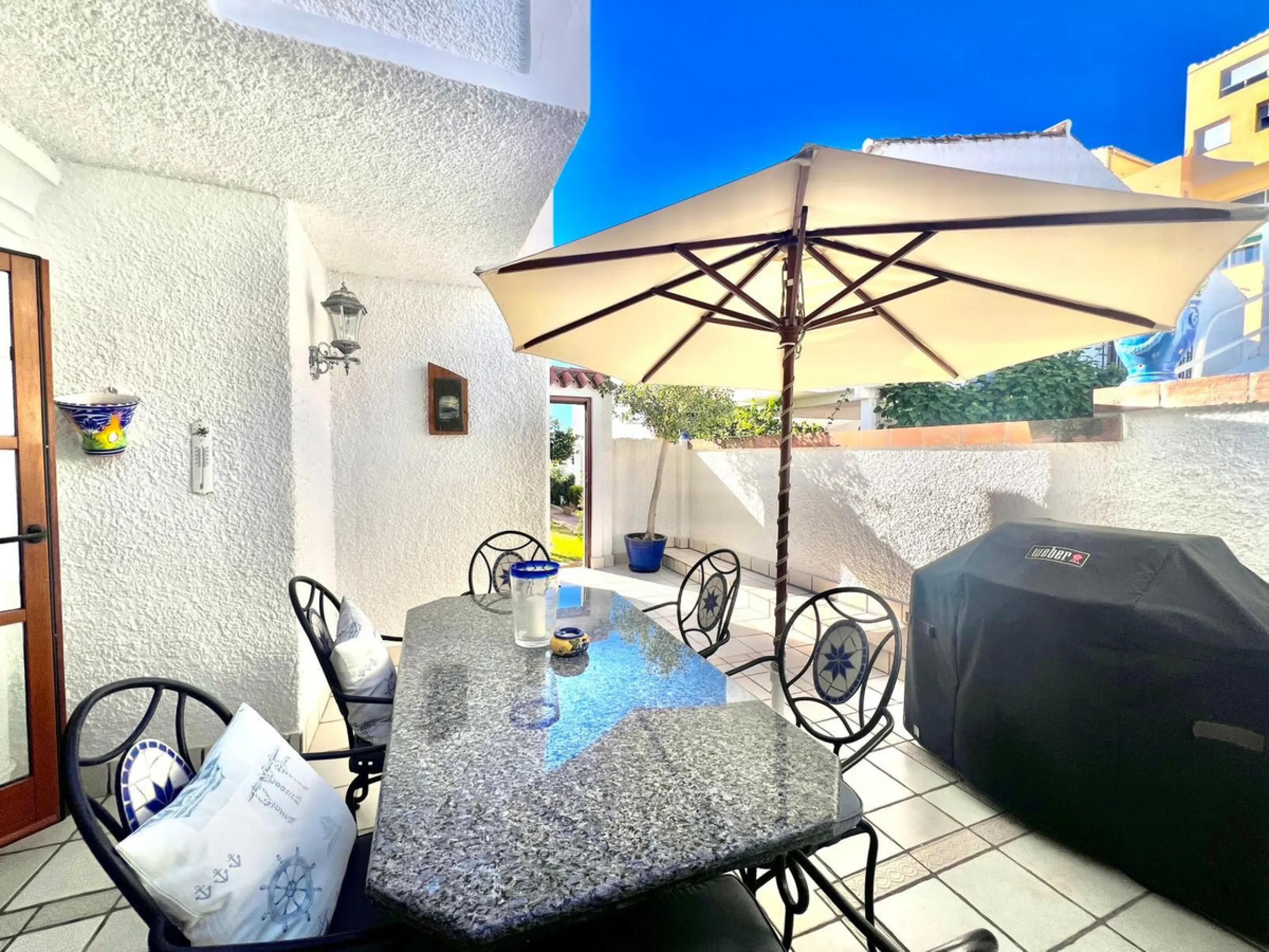 Beachfront complex in Estepona, New Golden Mile, between Cancelada and Selwo, close to Las Dunas. Stunning fully renovated corner semi-detached townhouse, located in a frontline beach complex with a unique charm, reminiscent of an authentic fishing villag