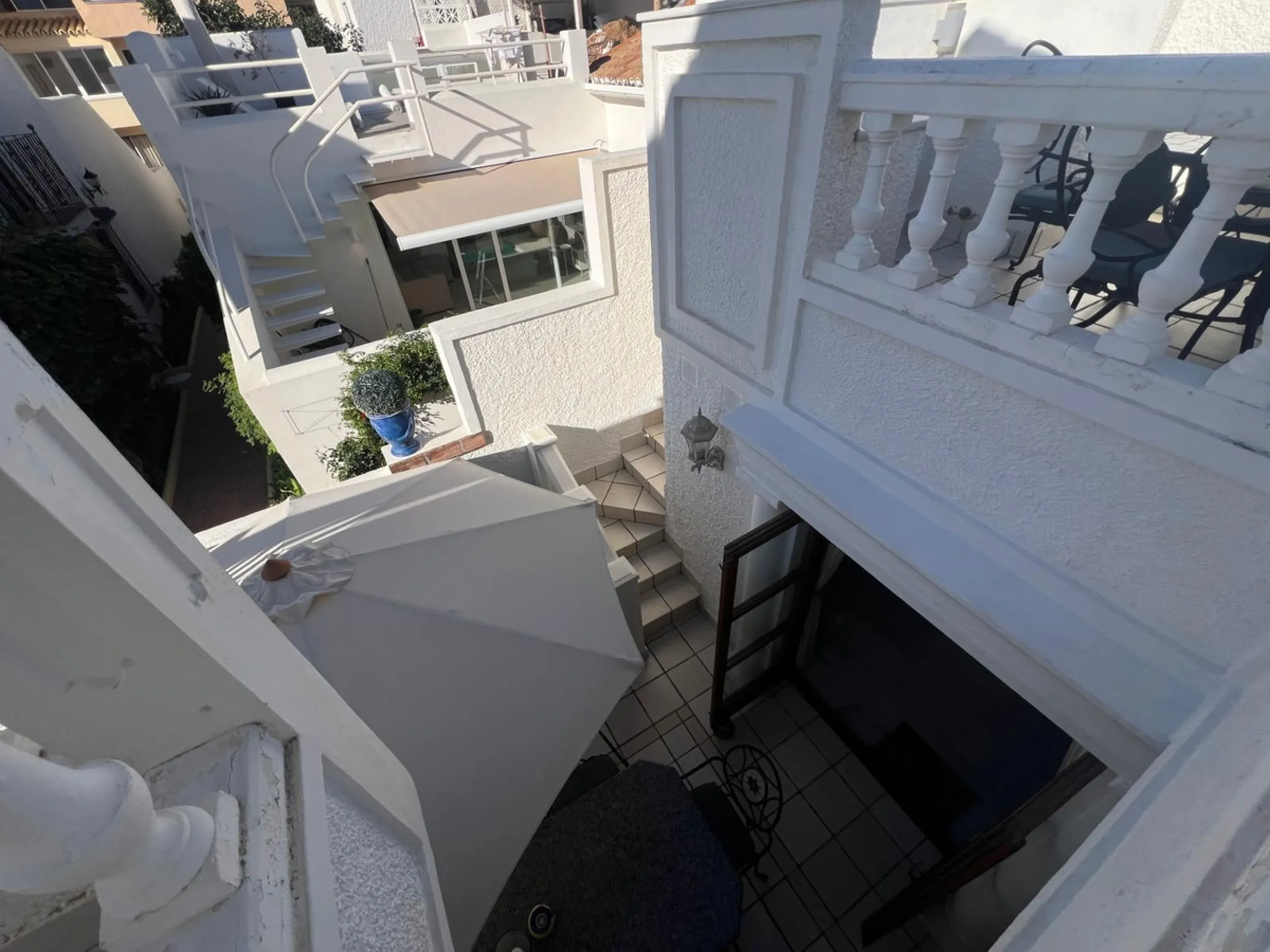 Beachfront complex in Estepona, New Golden Mile, between Cancelada and Selwo, close to Las Dunas. Stunning fully renovated corner semi-detached townhouse, located in a frontline beach complex with a unique charm, reminiscent of an authentic fishing villag