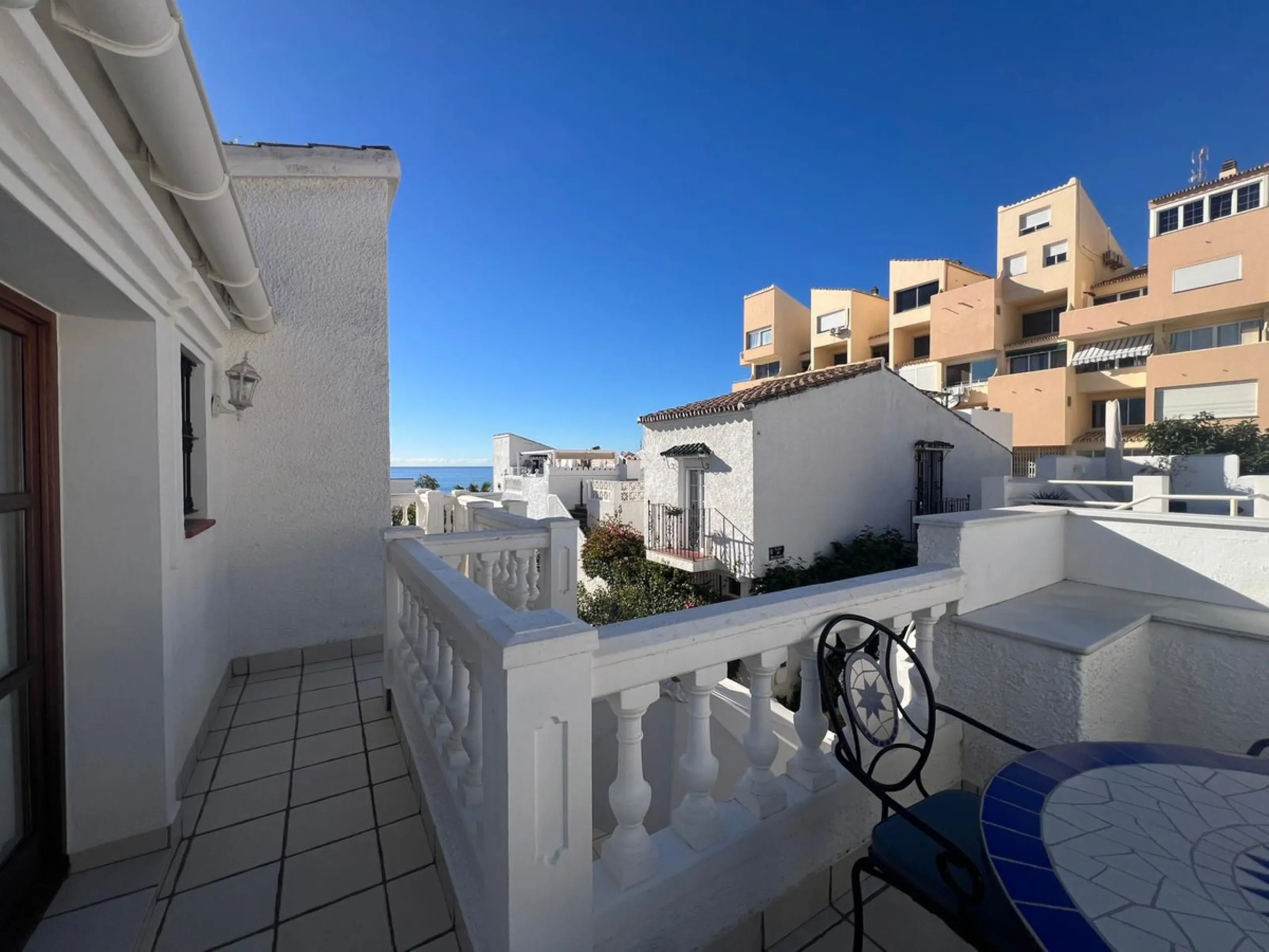 Beachfront complex in Estepona, New Golden Mile, between Cancelada and Selwo, close to Las Dunas. Stunning fully renovated corner semi-detached townhouse, located in a frontline beach complex with a unique charm, reminiscent of an authentic fishing villag