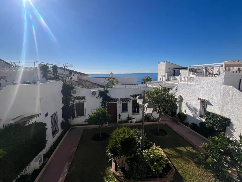 Beachfront complex in Estepona, New Golden Mile, between Cancelada and Selwo, close to Las Dunas. Stunning fully renovated corner semi-detached townhouse, located in a frontline beach complex with a unique charm, reminiscent of an authentic fishing villag