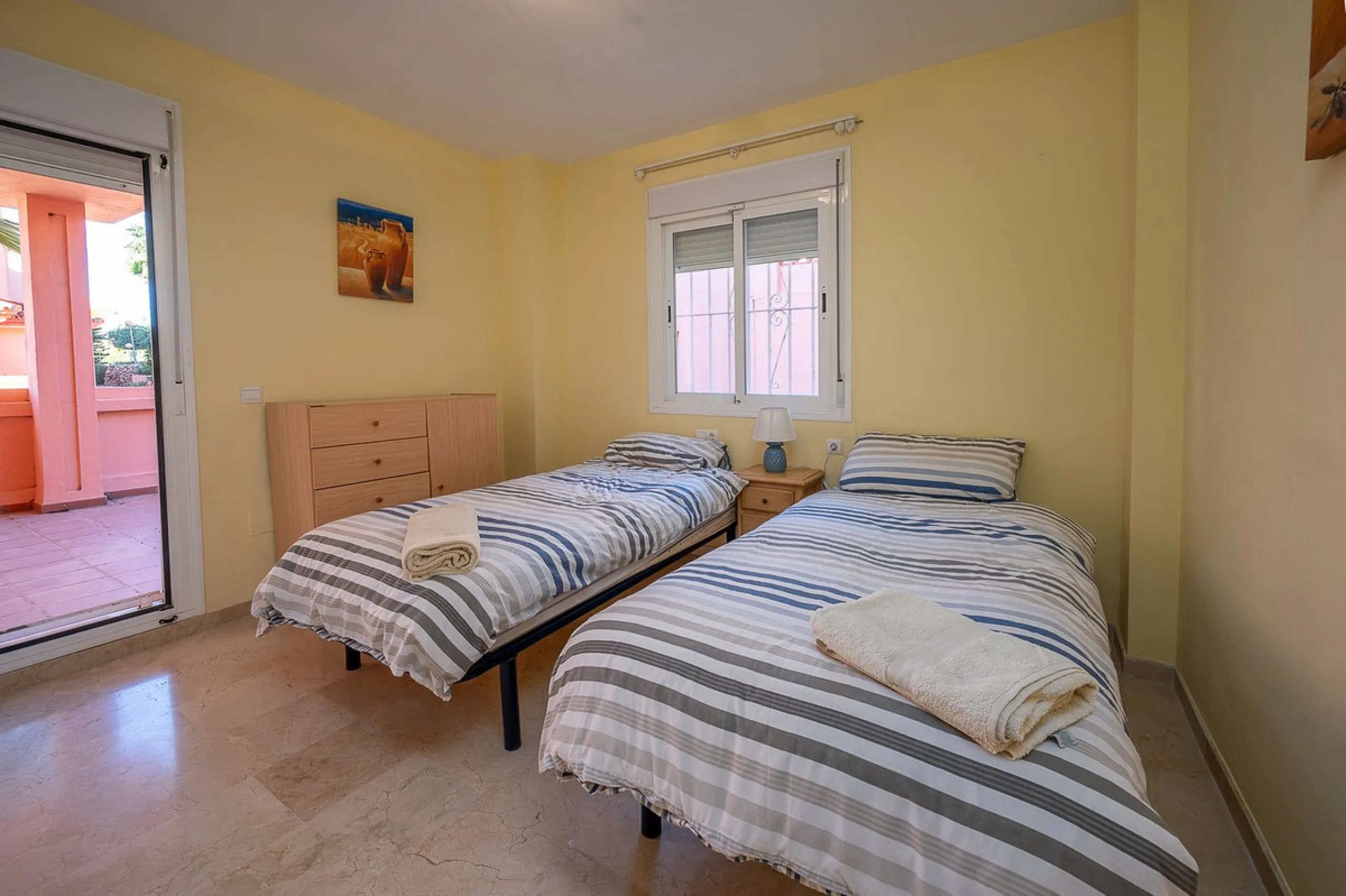 One-level apartment consisting of 3 double bedrooms, together with 3 bathrooms a large L shape terrace with the bonus of half being covered and the other half open to be able to enjoy the sun all day long which you has limited sea views. Property comes wi