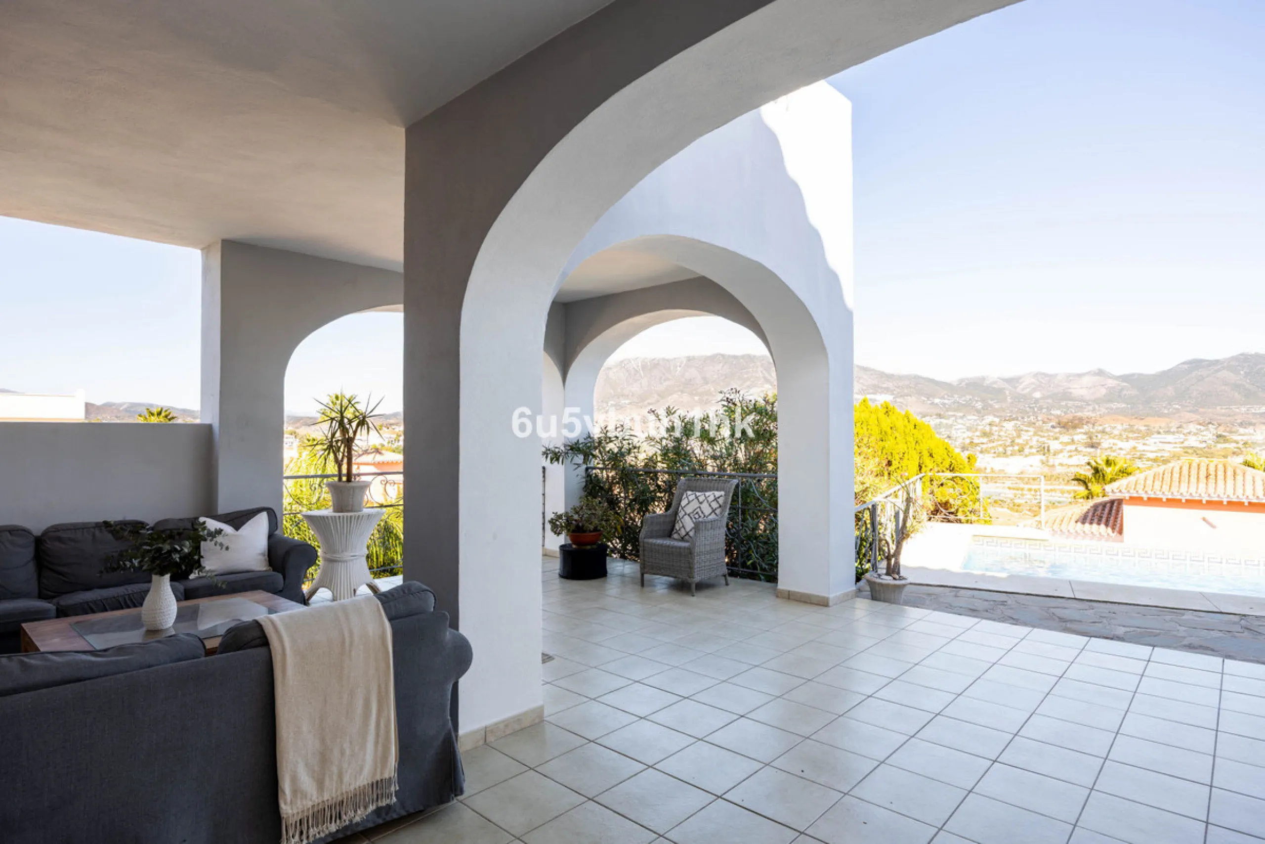 Imagine waking up to golden Mediterranean light, the scent of warm pine trees, and birdsong drifting across rolling green fairways. This exceptional 6-bedroom villa beside Cerrado del Aguila Golf & Resort offers more than a home – it offers a lifestyle sh