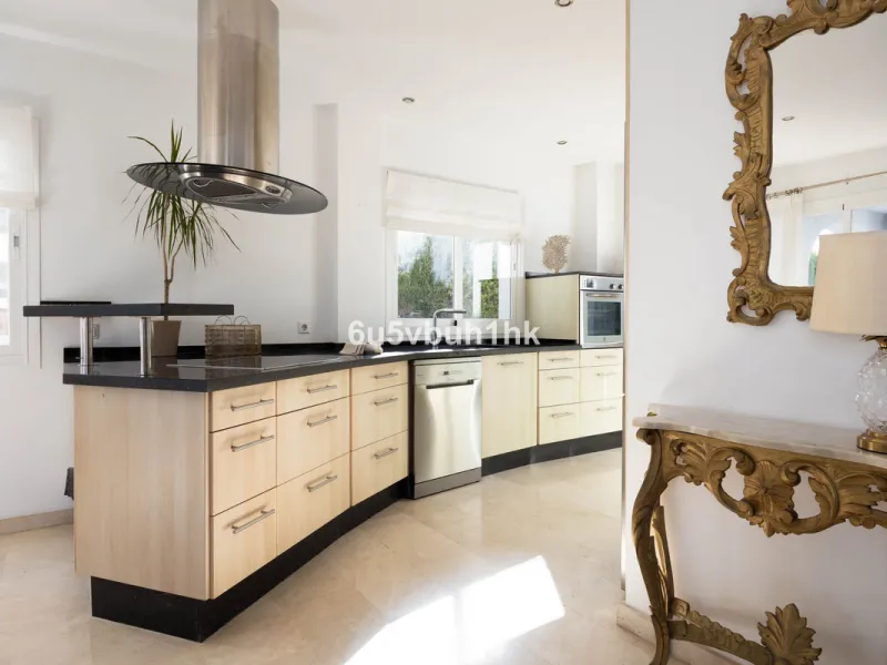 Imagine waking up to golden Mediterranean light, the scent of warm pine trees, and birdsong drifting across rolling green fairways. This exceptional 6-bedroom villa beside Cerrado del Aguila Golf & Resort offers more than a home – it offers a lifestyle sh