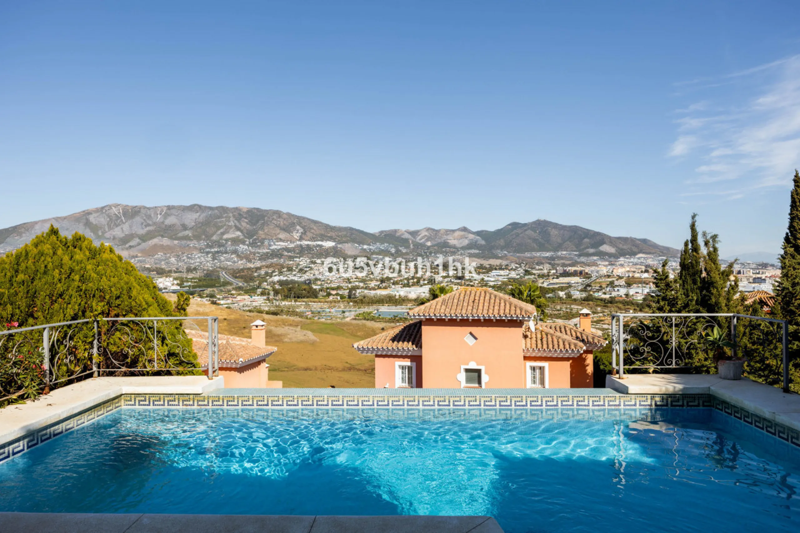 Imagine waking up to golden Mediterranean light, the scent of warm pine trees, and birdsong drifting across rolling green fairways. This exceptional 6-bedroom villa beside Cerrado del Aguila Golf & Resort offers more than a home – it offers a lifestyle sh