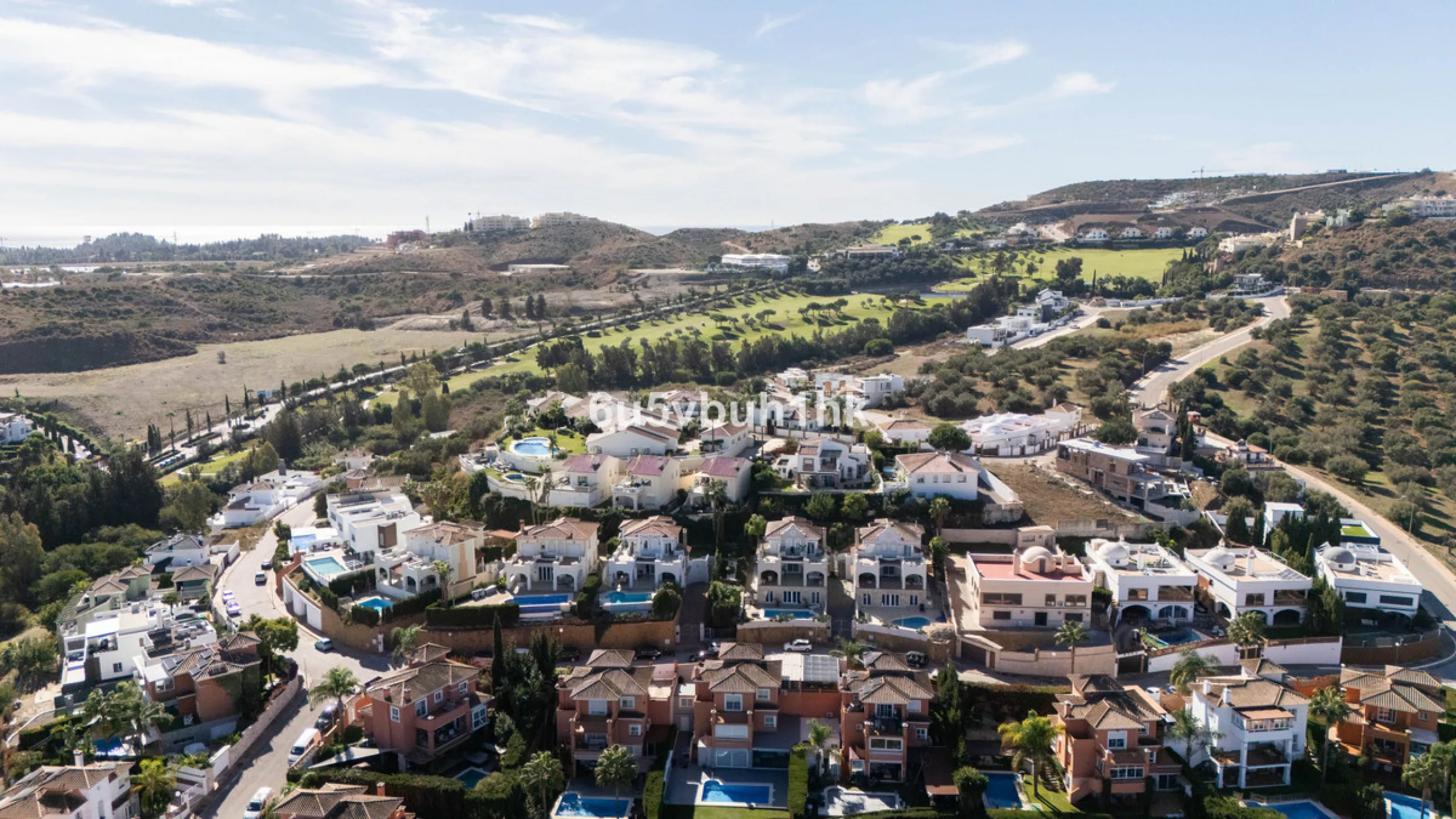 Imagine waking up to golden Mediterranean light, the scent of warm pine trees, and birdsong drifting across rolling green fairways. This exceptional 6-bedroom villa beside Cerrado del Aguila Golf & Resort offers more than a home – it offers a lifestyle sh