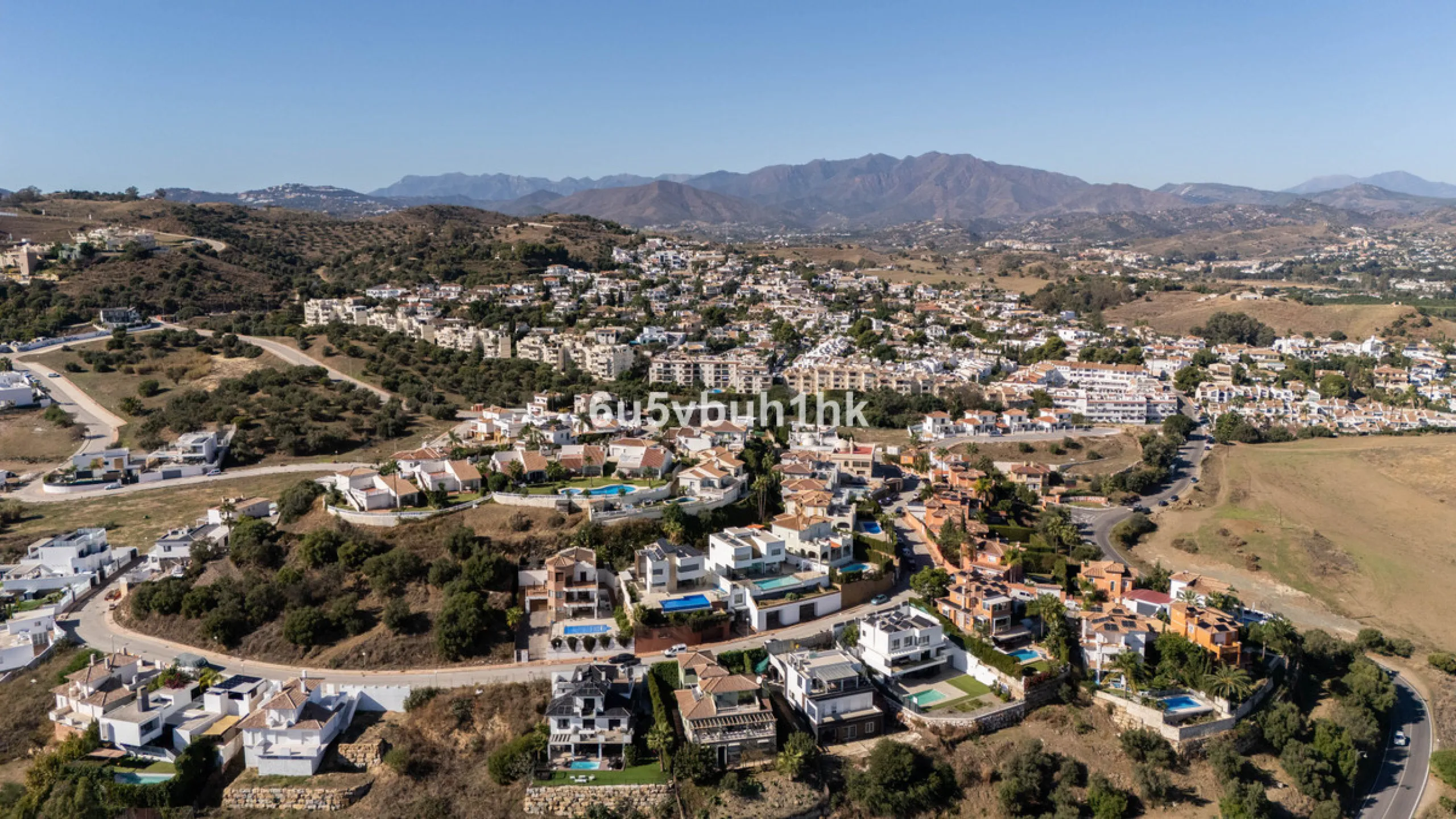 Imagine waking up to golden Mediterranean light, the scent of warm pine trees, and birdsong drifting across rolling green fairways. This exceptional 6-bedroom villa beside Cerrado del Aguila Golf & Resort offers more than a home – it offers a lifestyle sh