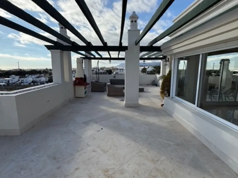A rare opportunity to find a penthouse in Nueva Andalucia with almost 300 m2 terrace wrapped around the 3 bed apartment.