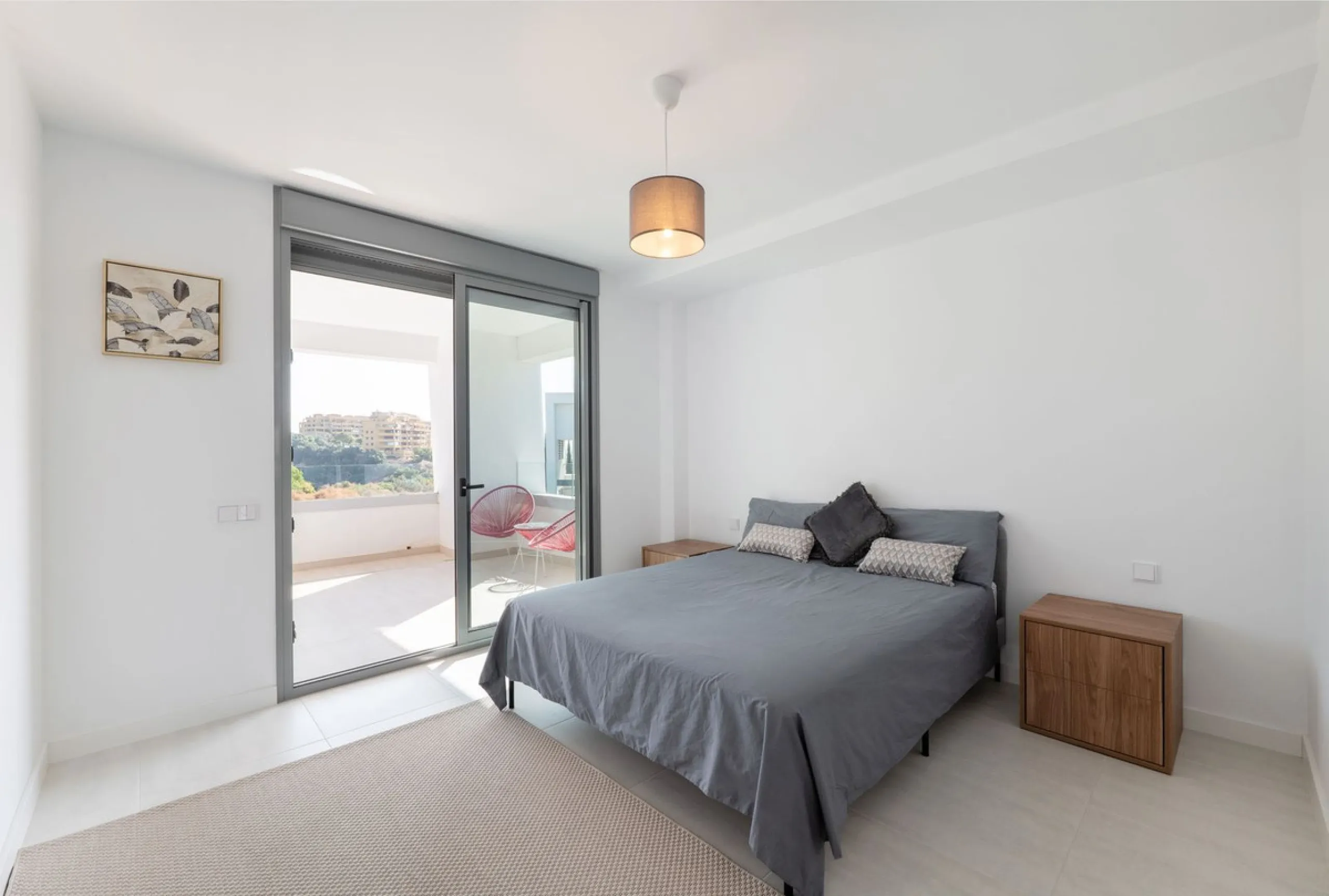 Modern apartment in a gated community with pools and gym