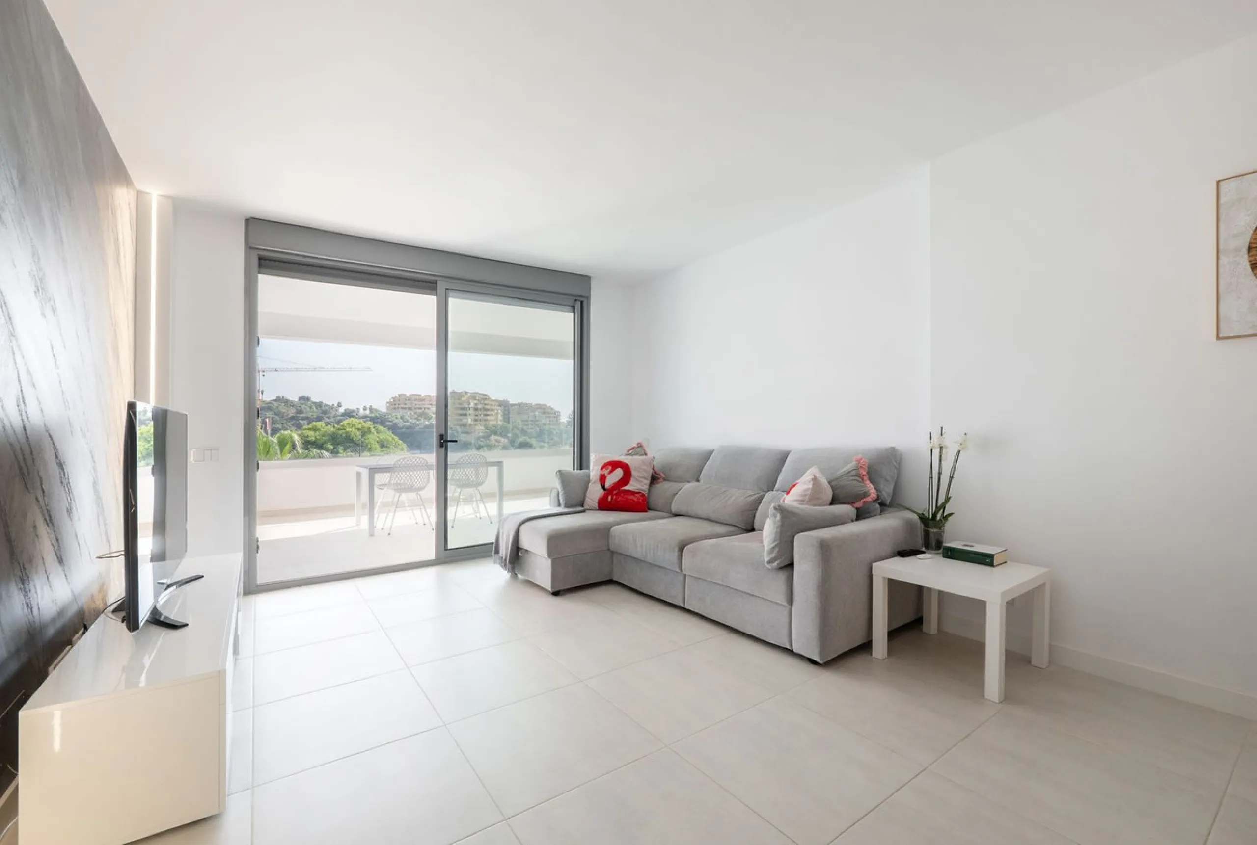 Modern apartment in a gated community with pools and gym