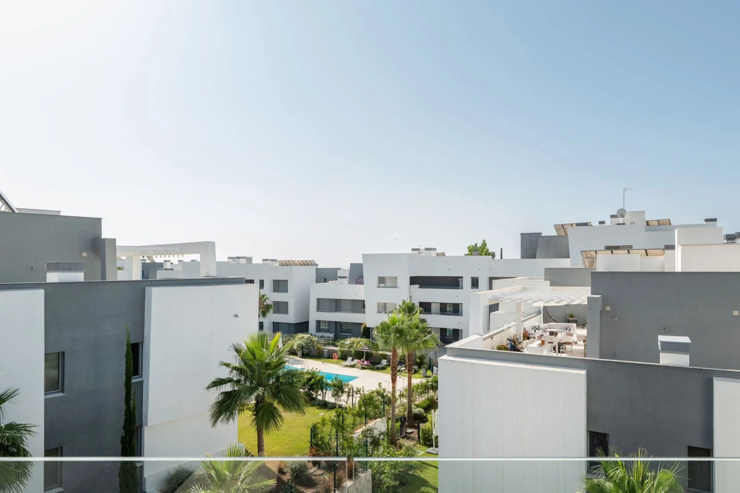 Modern apartment in a gated community with pools and gym