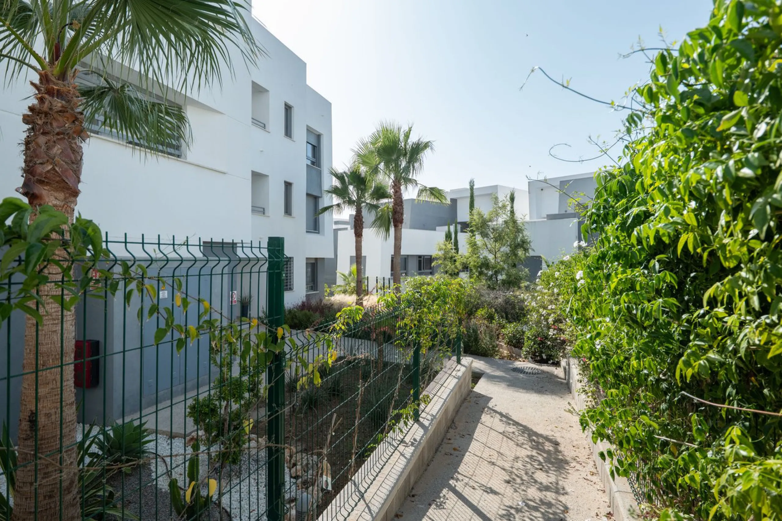 Modern apartment in a gated community with pools and gym