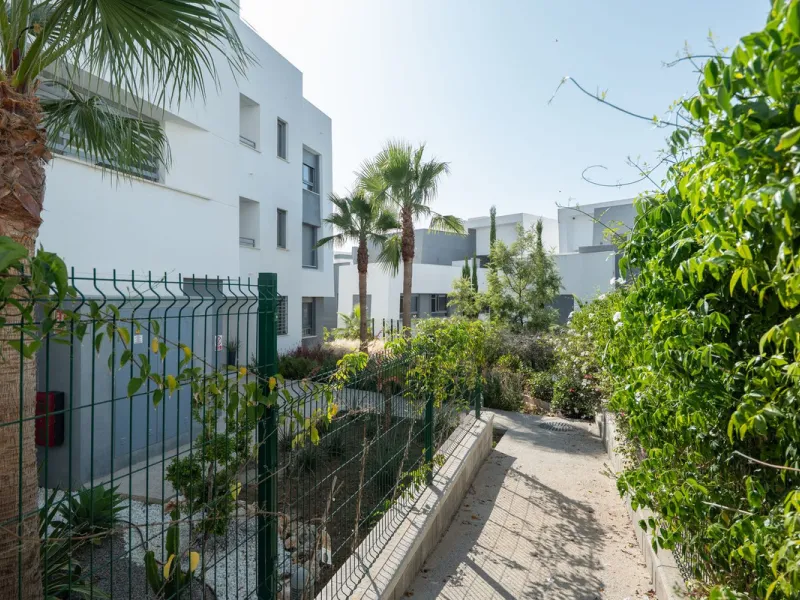 Modern apartment in a gated community with pools and gym