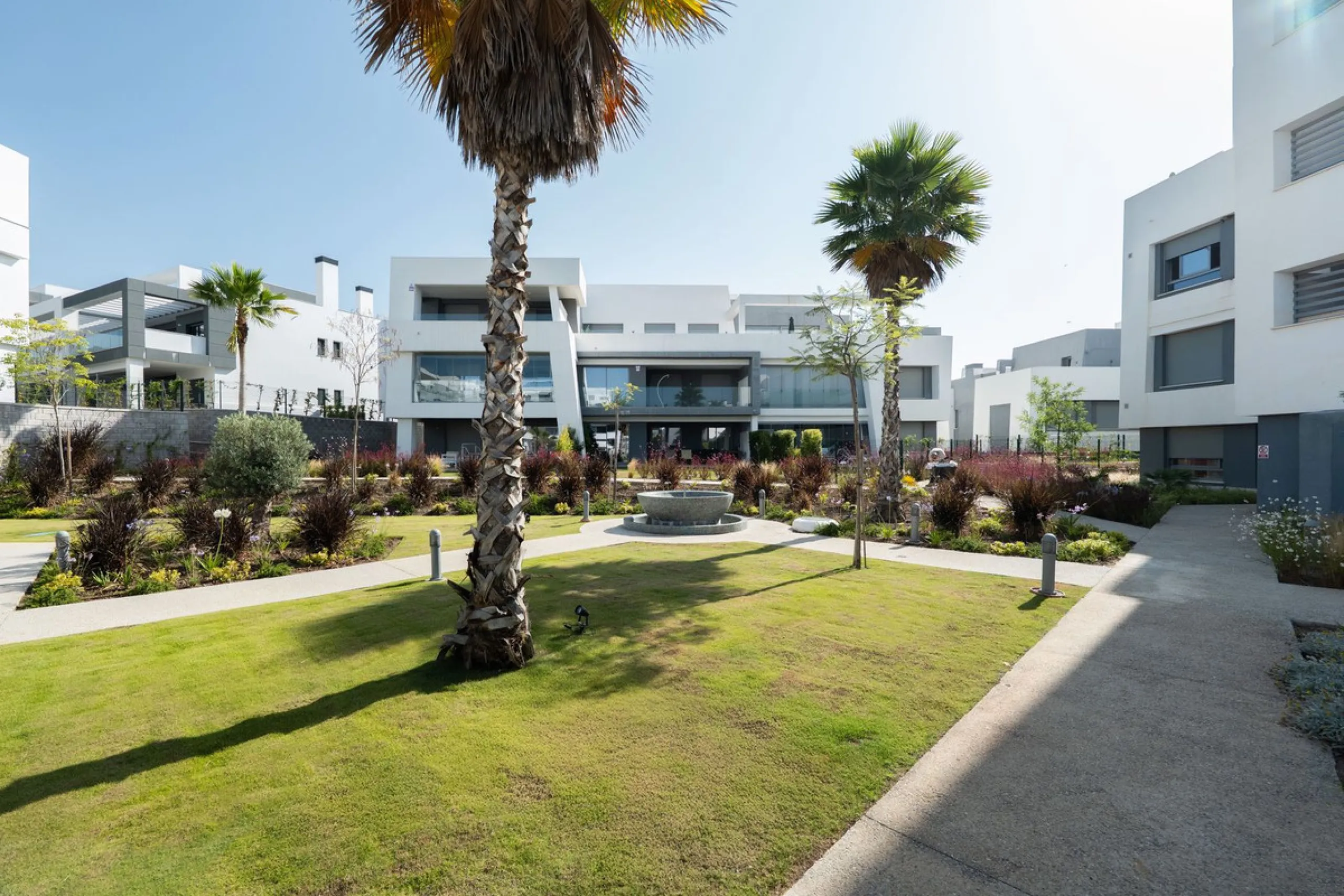 Modern apartment in a gated community with pools and gym