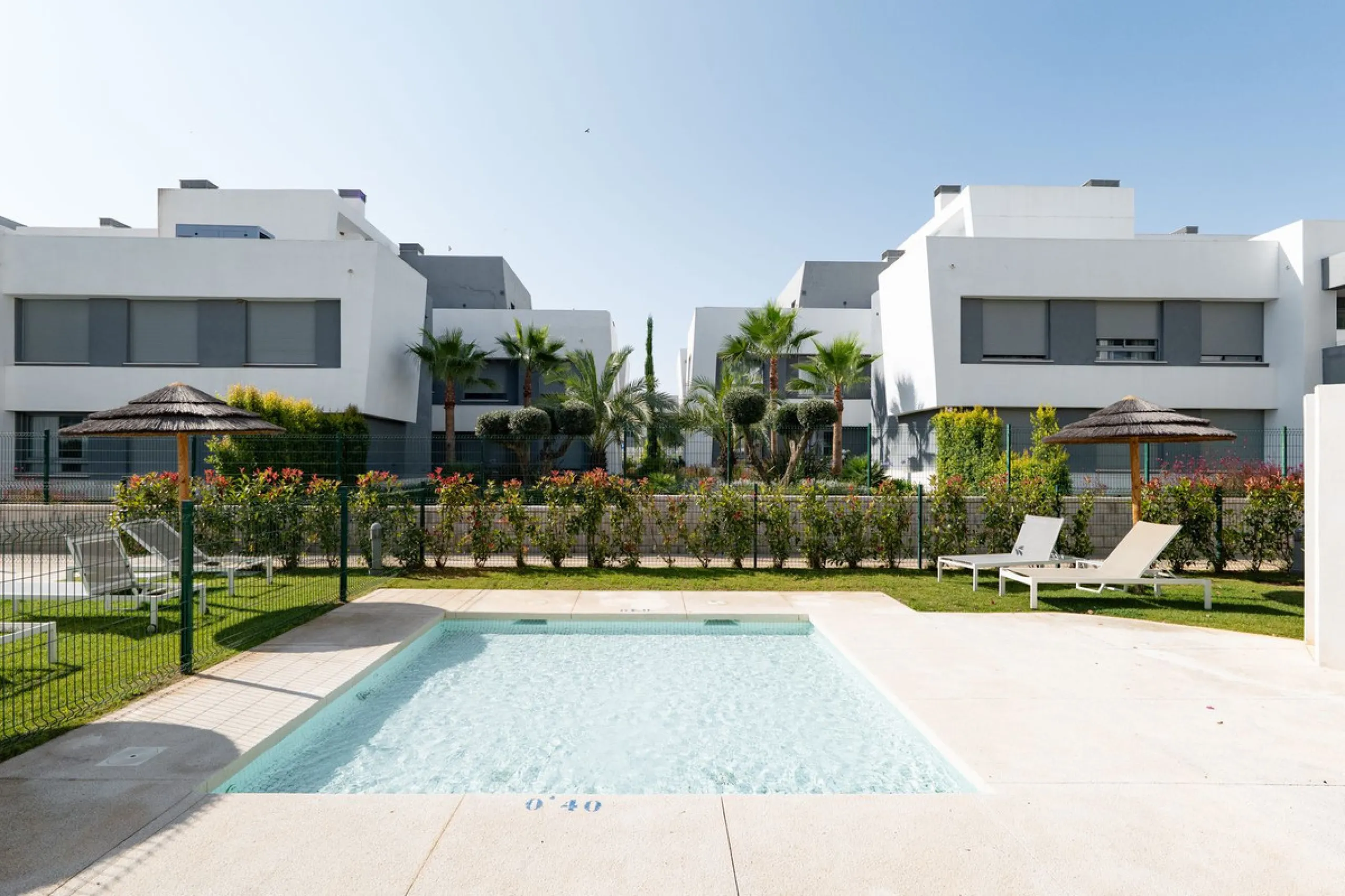 Modern apartment in a gated community with pools and gym