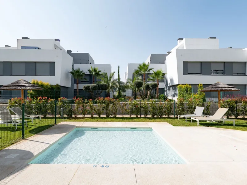 Modern apartment in a gated community with pools and gym