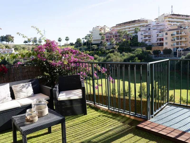 Perfect investment: TOURIST LICENCE and superbly located 2-bedroom apartment with panoramic sea and golf views