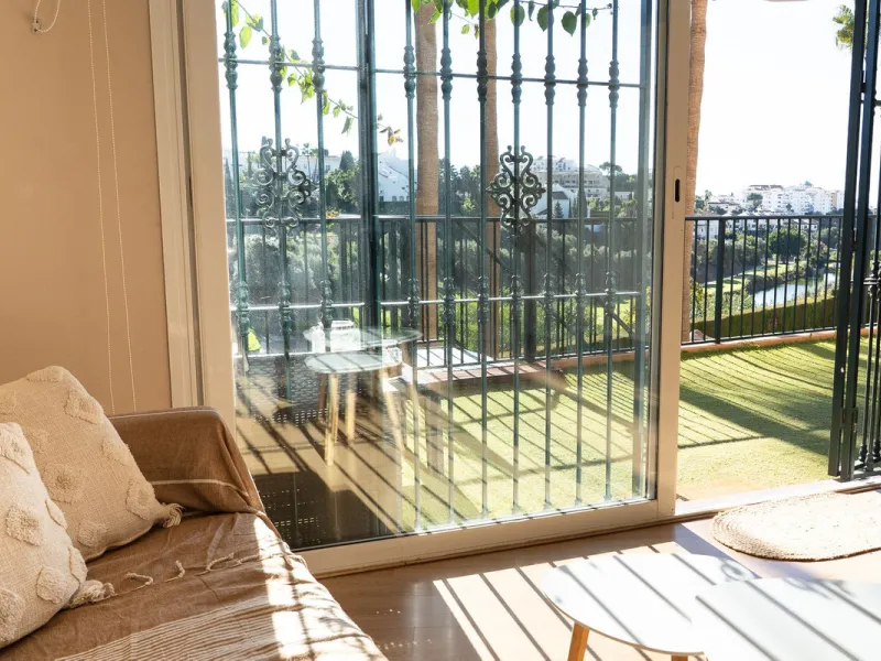 Perfect investment: TOURIST LICENCE and superbly located 2-bedroom apartment with panoramic sea and golf views
