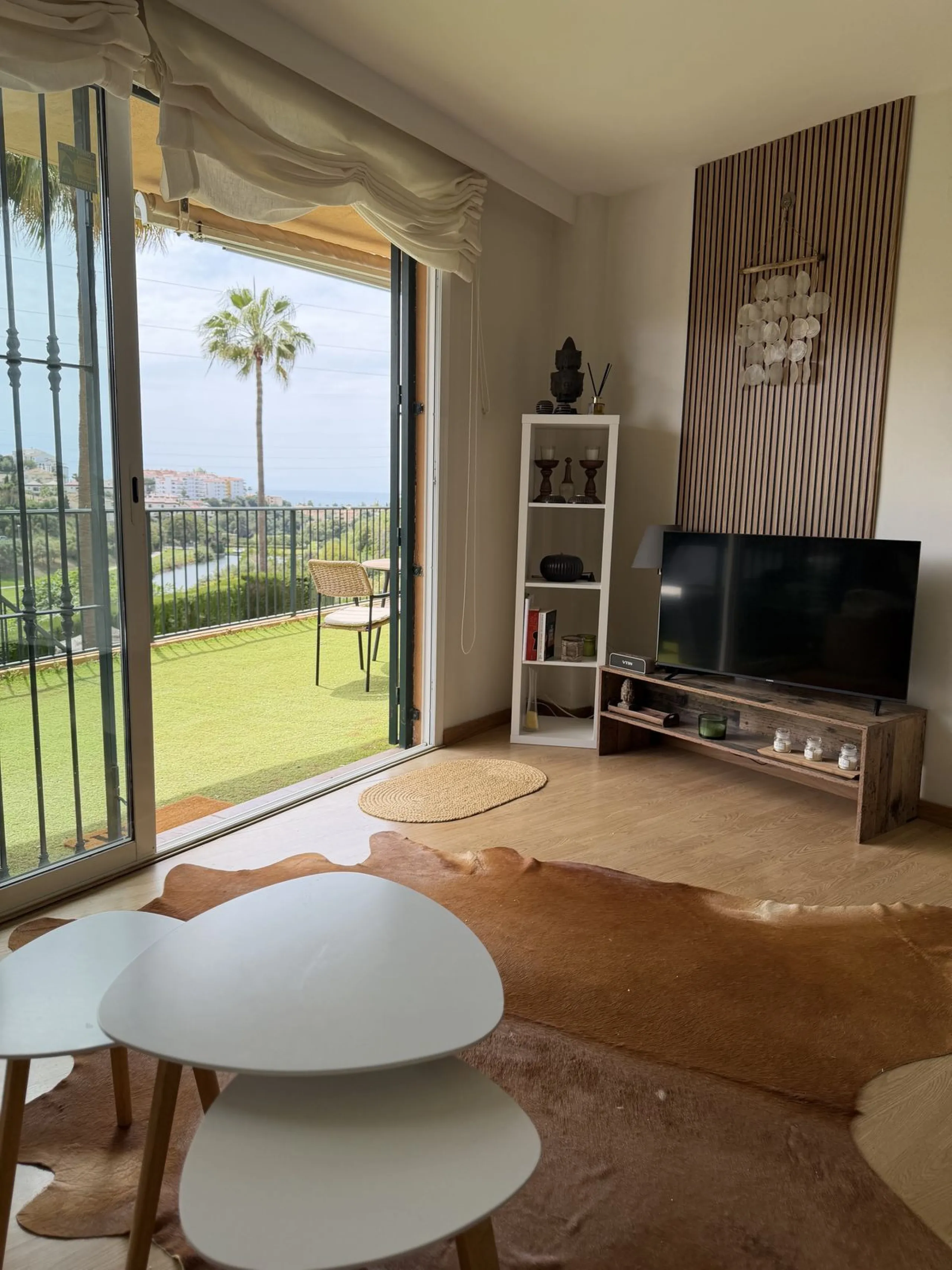 Perfect investment: TOURIST LICENCE and superbly located 2-bedroom apartment with panoramic sea and golf views