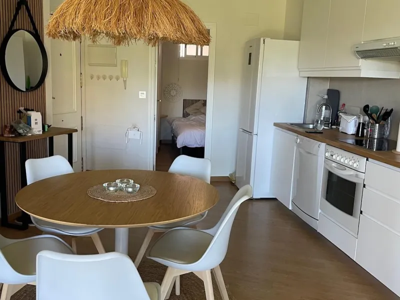 Perfect investment: TOURIST LICENCE and superbly located 2-bedroom apartment with panoramic sea and golf views