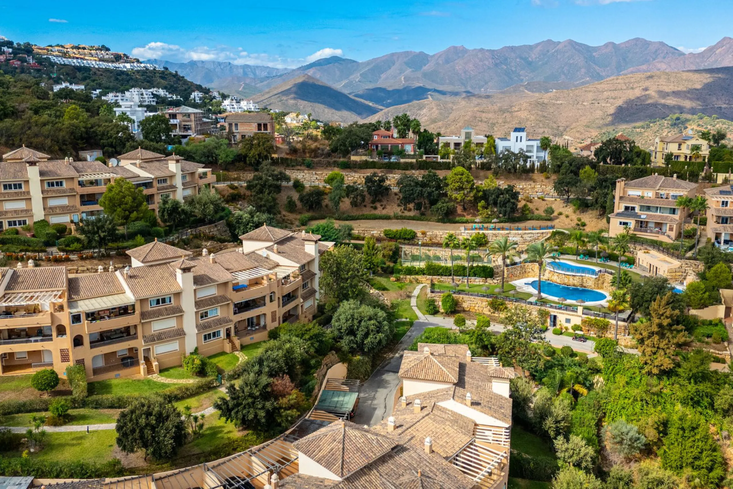 Discover this beautiful 2-bedroom 'penthouse-like feel' middle-floor apartment perfectly positioned in the prestigious enclave of La Mairena / Elviria Alta on Marbella's sought-after east coast. Surrounded by natural beauty, SEA and mountain views, this e