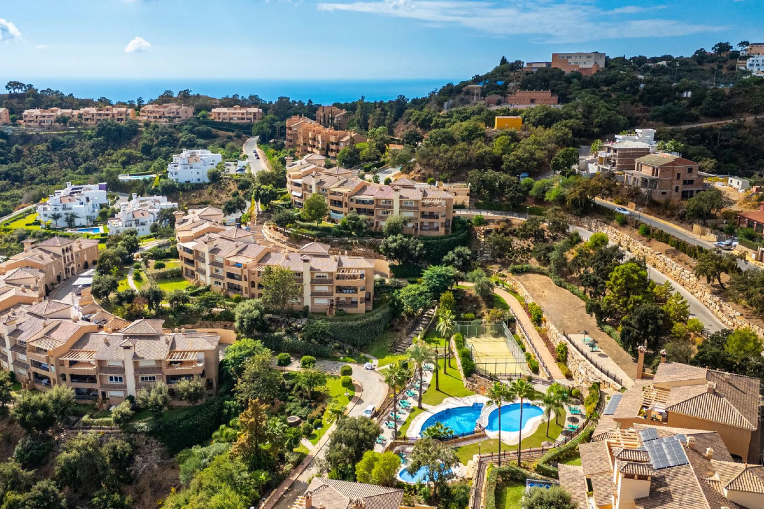 Discover this beautiful 2-bedroom 'penthouse-like feel' middle-floor apartment perfectly positioned in the prestigious enclave of La Mairena / Elviria Alta on Marbella's sought-after east coast. Surrounded by natural beauty, SEA and mountain views, this e
