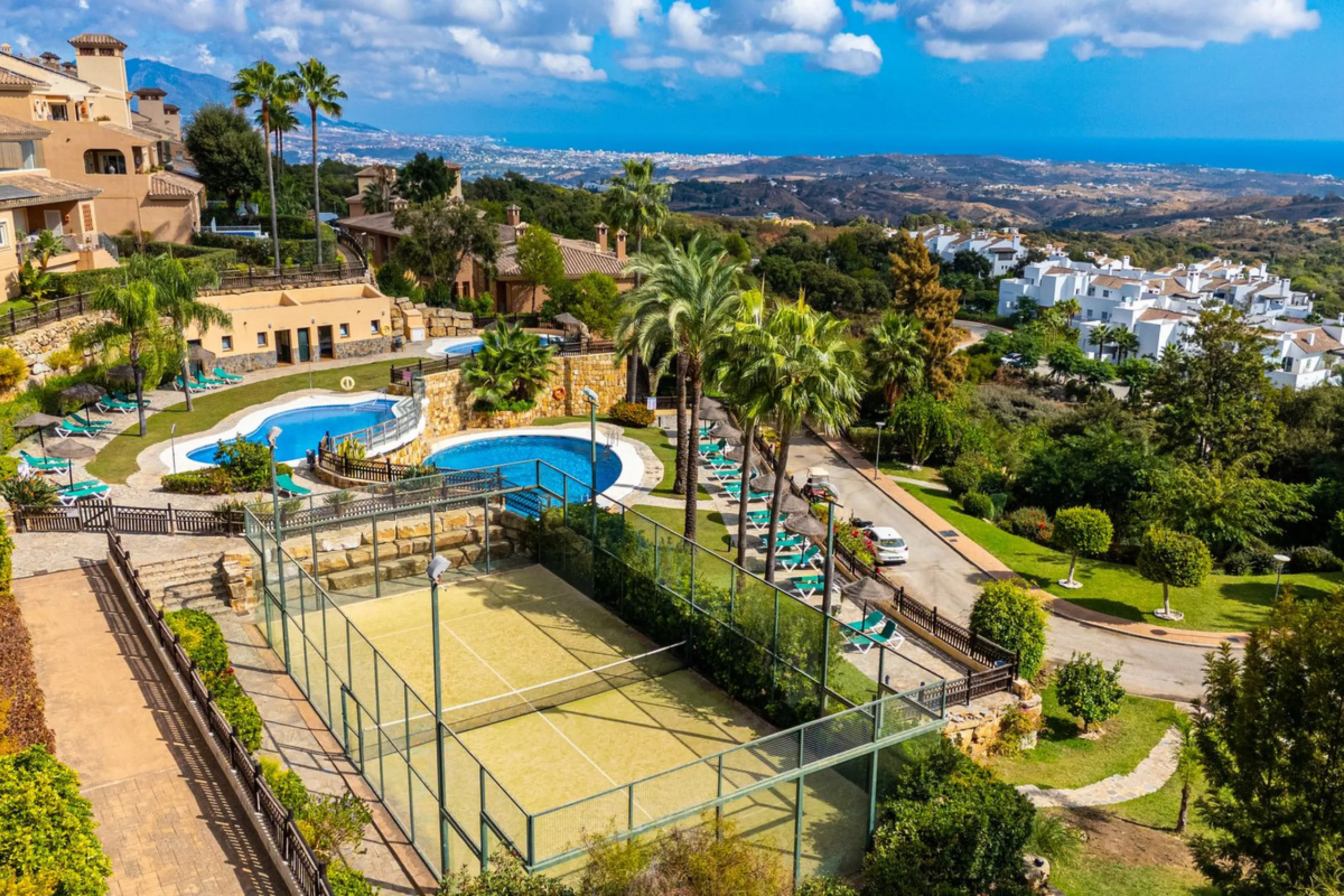 Discover this beautiful 2-bedroom 'penthouse-like feel' middle-floor apartment perfectly positioned in the prestigious enclave of La Mairena / Elviria Alta on Marbella's sought-after east coast. Surrounded by natural beauty, SEA and mountain views, this e