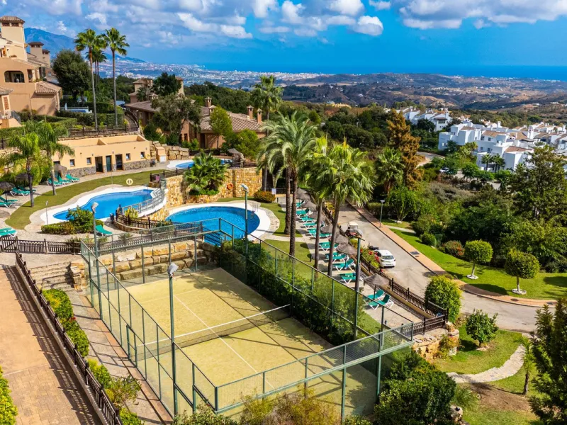 Discover this beautiful 2-bedroom 'penthouse-like feel' middle-floor apartment perfectly positioned in the prestigious enclave of La Mairena / Elviria Alta on Marbella's sought-after east coast. Surrounded by natural beauty, SEA and mountain views, this e