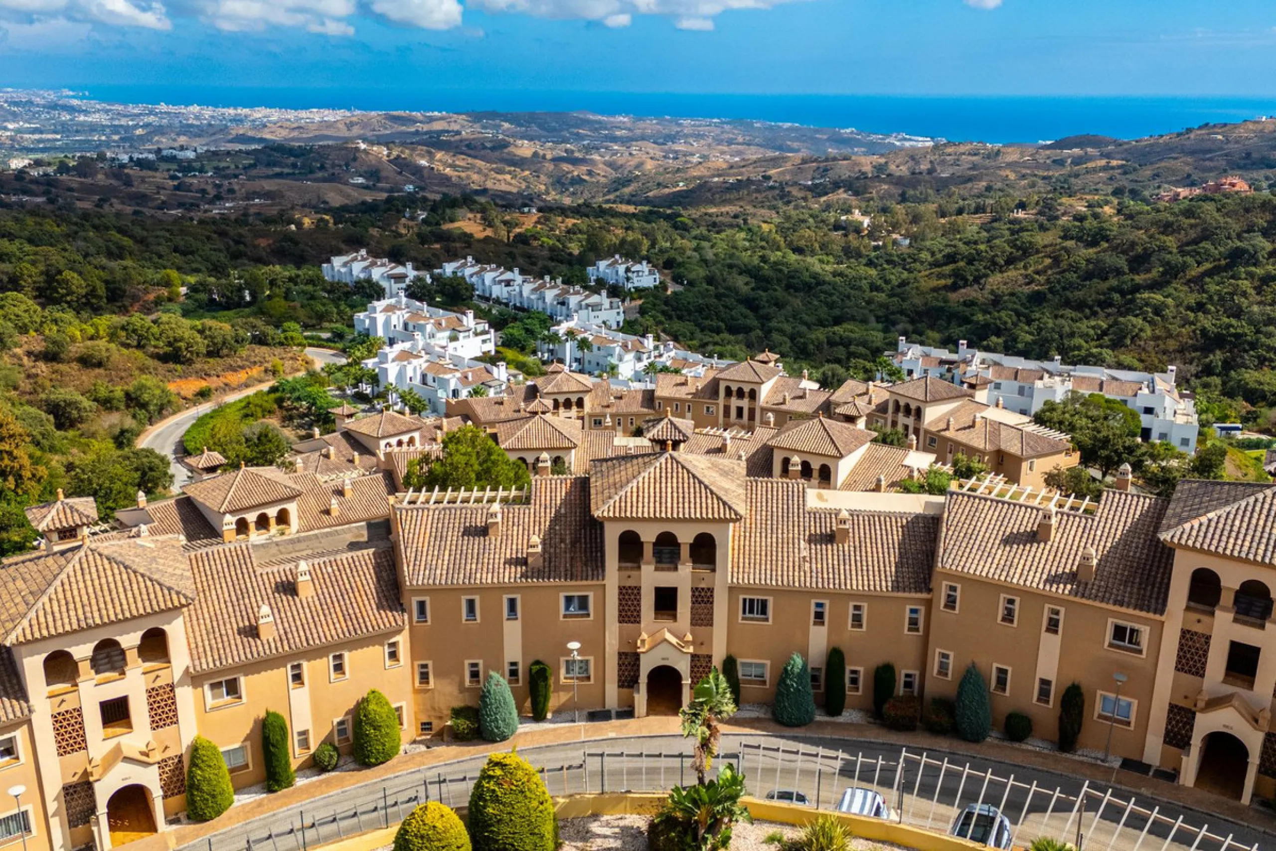 Discover this beautiful 2-bedroom 'penthouse-like feel' middle-floor apartment perfectly positioned in the prestigious enclave of La Mairena / Elviria Alta on Marbella's sought-after east coast. Surrounded by natural beauty, SEA and mountain views, this e