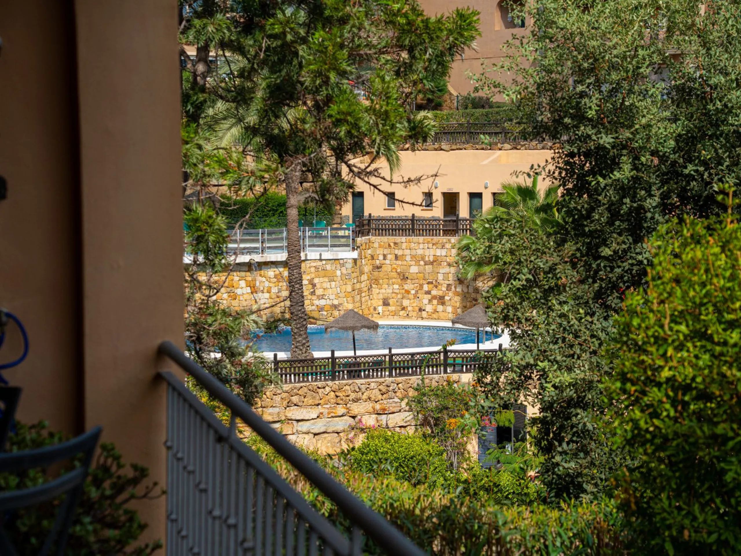 Discover this beautiful 2-bedroom 'penthouse-like feel' middle-floor apartment perfectly positioned in the prestigious enclave of La Mairena / Elviria Alta on Marbella's sought-after east coast. Surrounded by natural beauty, SEA and mountain views, this e