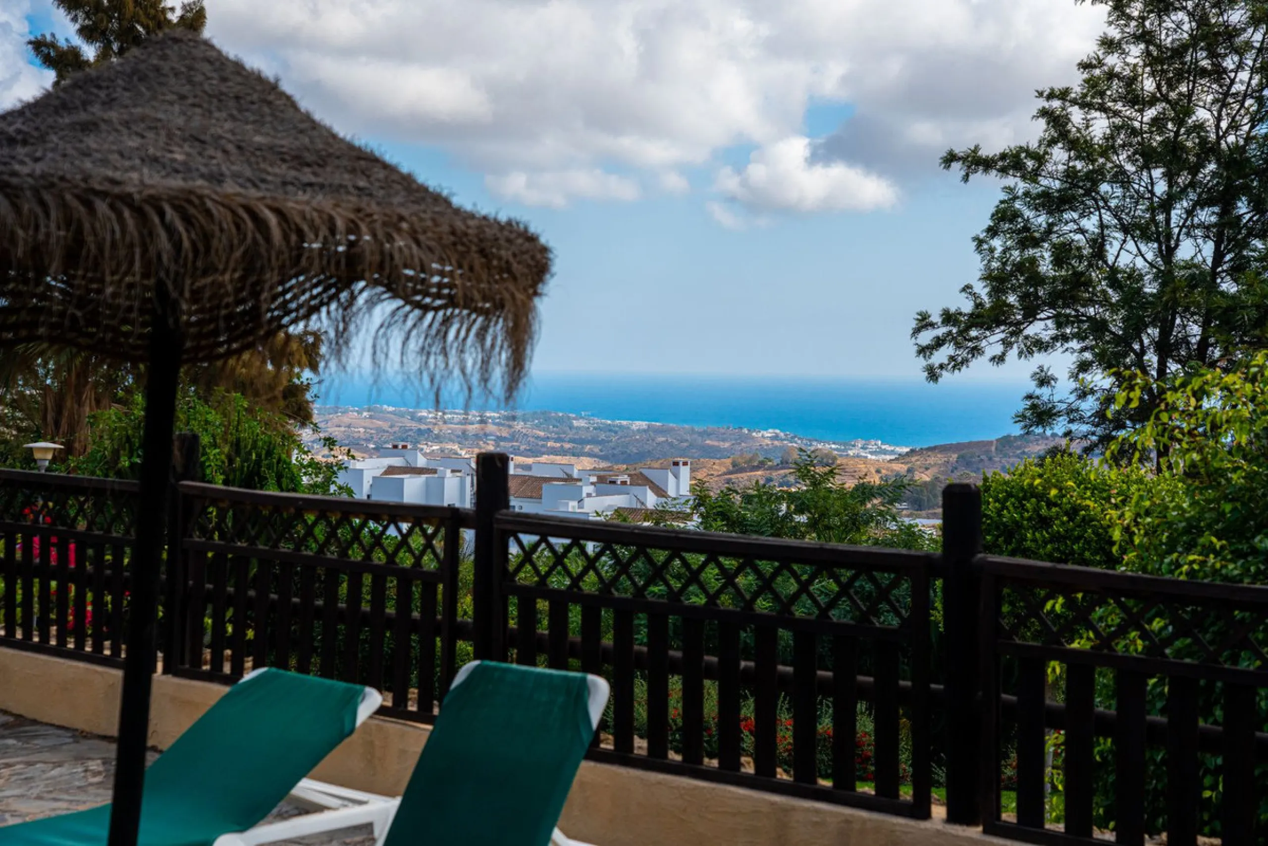 Discover this beautiful 2-bedroom 'penthouse-like feel' middle-floor apartment perfectly positioned in the prestigious enclave of La Mairena / Elviria Alta on Marbella's sought-after east coast. Surrounded by natural beauty, SEA and mountain views, this e