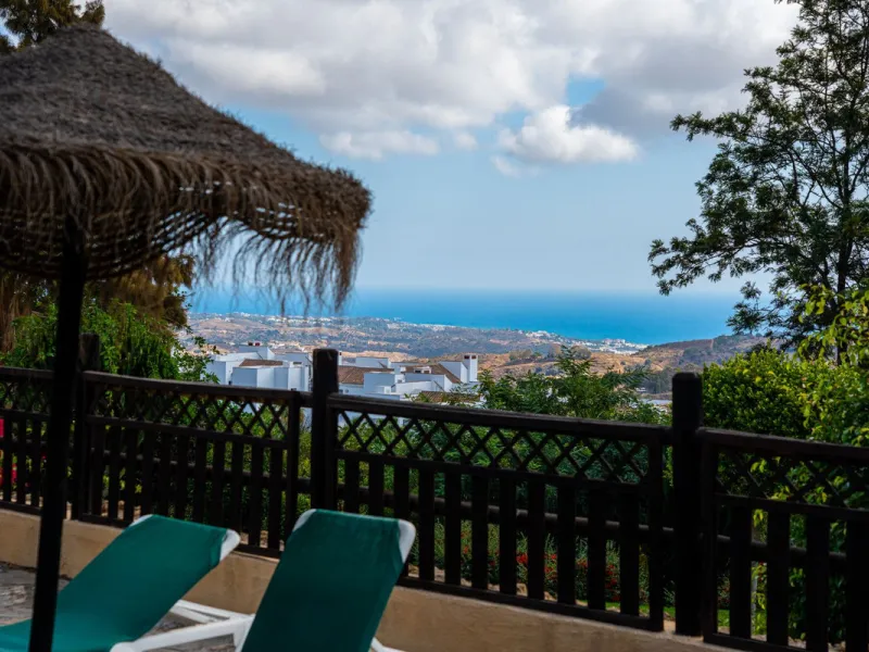 Discover this beautiful 2-bedroom 'penthouse-like feel' middle-floor apartment perfectly positioned in the prestigious enclave of La Mairena / Elviria Alta on Marbella's sought-after east coast. Surrounded by natural beauty, SEA and mountain views, this e