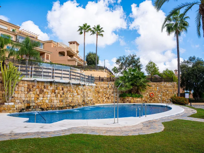 Discover this beautiful 2-bedroom 'penthouse-like feel' middle-floor apartment perfectly positioned in the prestigious enclave of La Mairena / Elviria Alta on Marbella's sought-after east coast. Surrounded by natural beauty, SEA and mountain views, this e