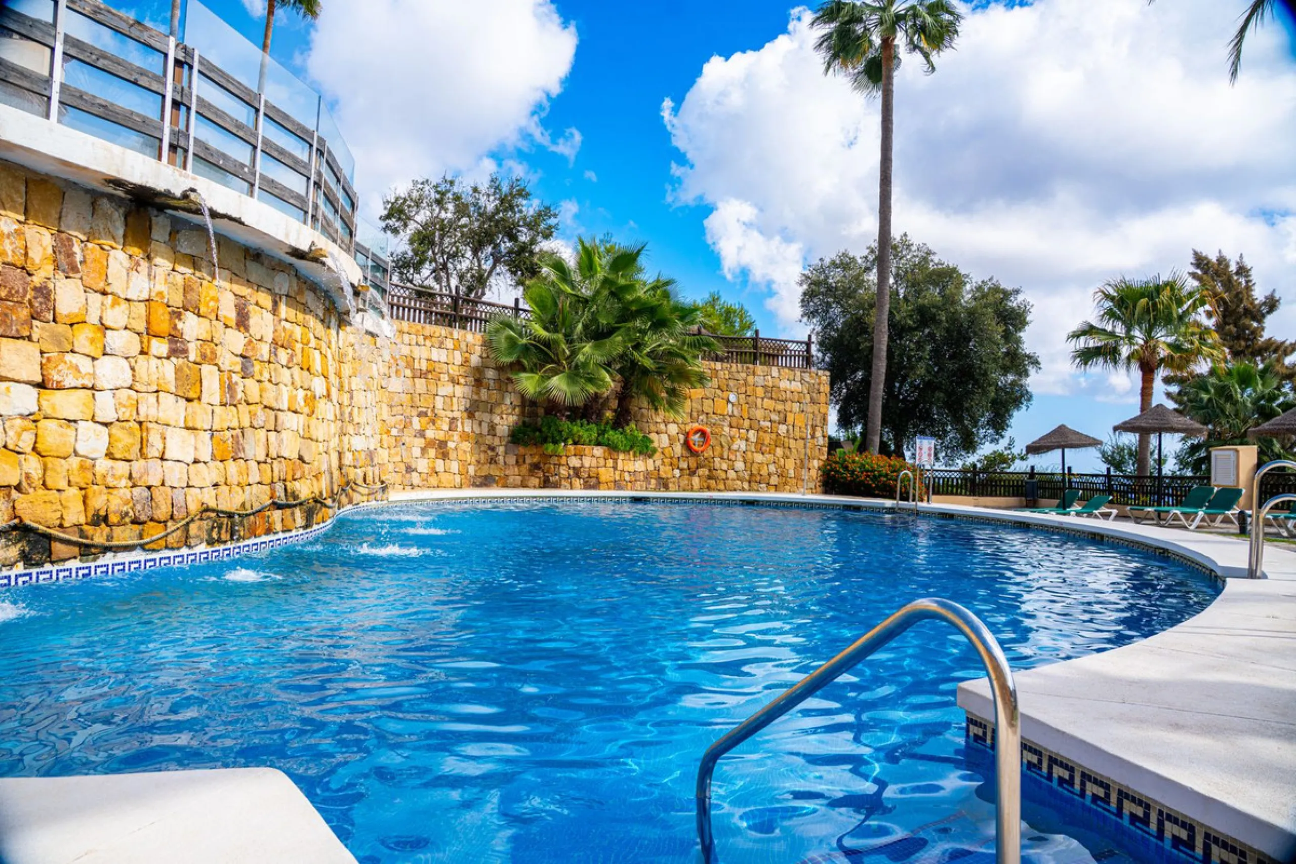 Discover this beautiful 2-bedroom 'penthouse-like feel' middle-floor apartment perfectly positioned in the prestigious enclave of La Mairena / Elviria Alta on Marbella's sought-after east coast. Surrounded by natural beauty, SEA and mountain views, this e
