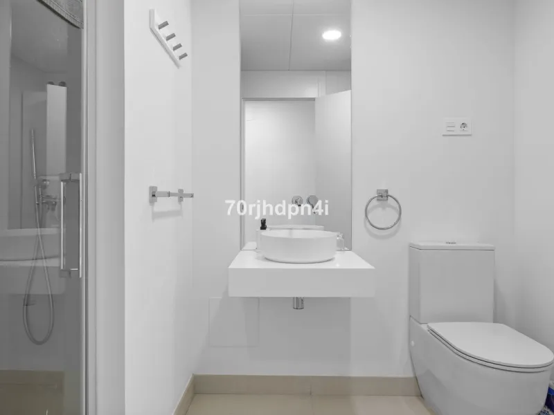 Modern first-floor apartment in ONE Residences, Calanova Golf, offering panoramic sea and golf views. South-facing with a spacious 40 m² terrace.