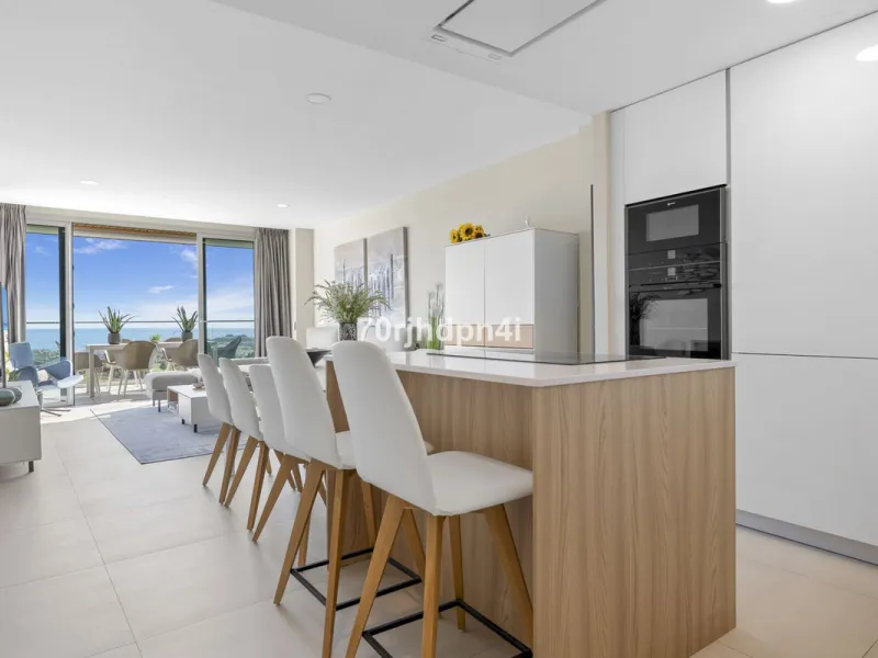 Modern first-floor apartment in ONE Residences, Calanova Golf, offering panoramic sea and golf views. South-facing with a spacious 40 m² terrace.
