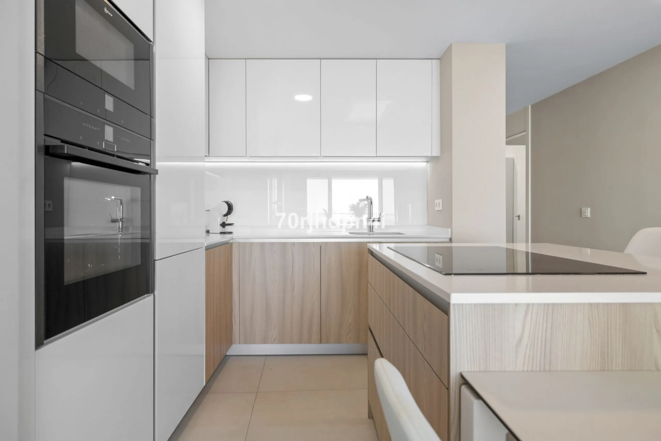 Modern first-floor apartment in ONE Residences, Calanova Golf, offering panoramic sea and golf views. South-facing with a spacious 40 m² terrace.