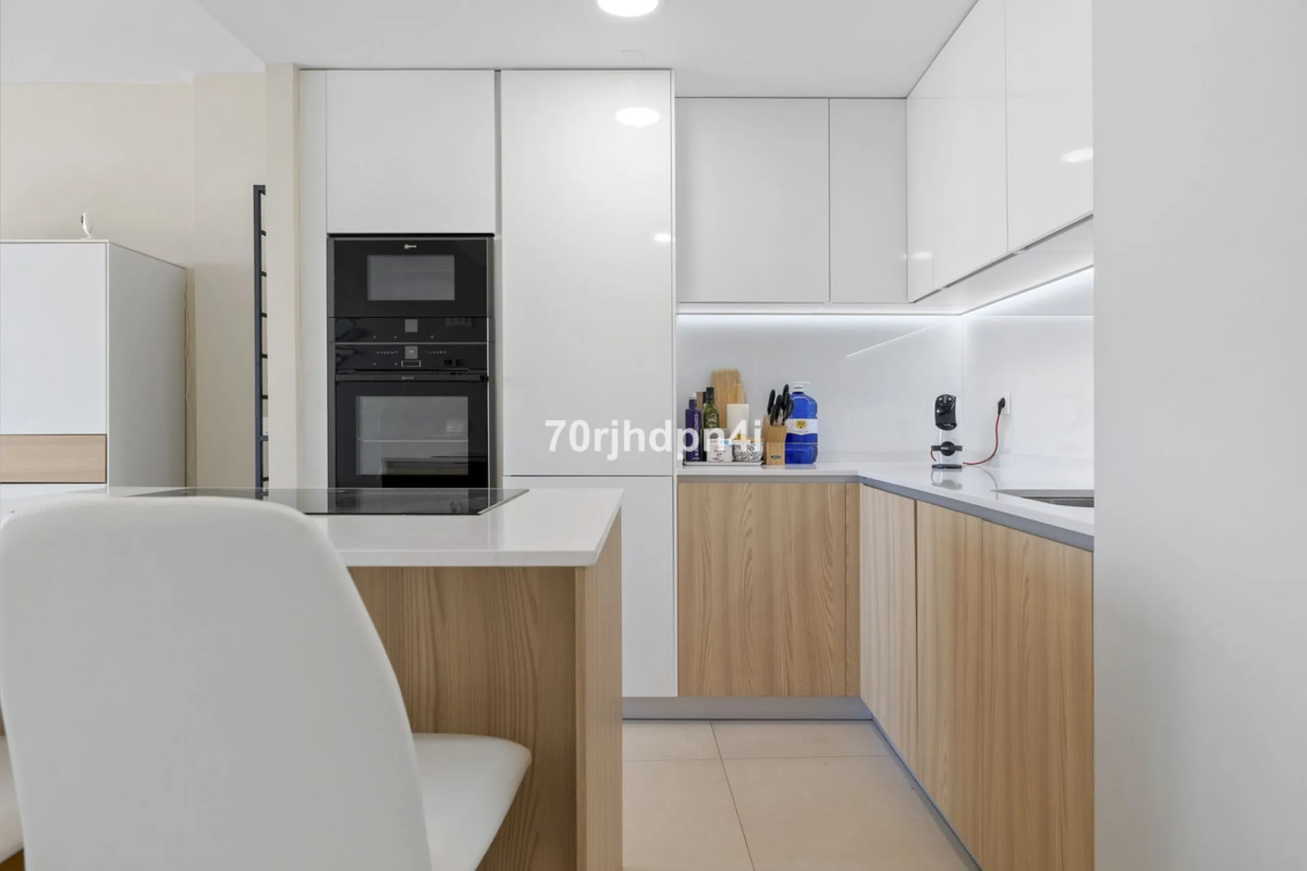 Modern first-floor apartment in ONE Residences, Calanova Golf, offering panoramic sea and golf views. South-facing with a spacious 40 m² terrace.