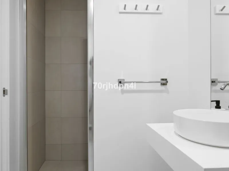 Modern first-floor apartment in ONE Residences, Calanova Golf, offering panoramic sea and golf views. South-facing with a spacious 40 m² terrace.