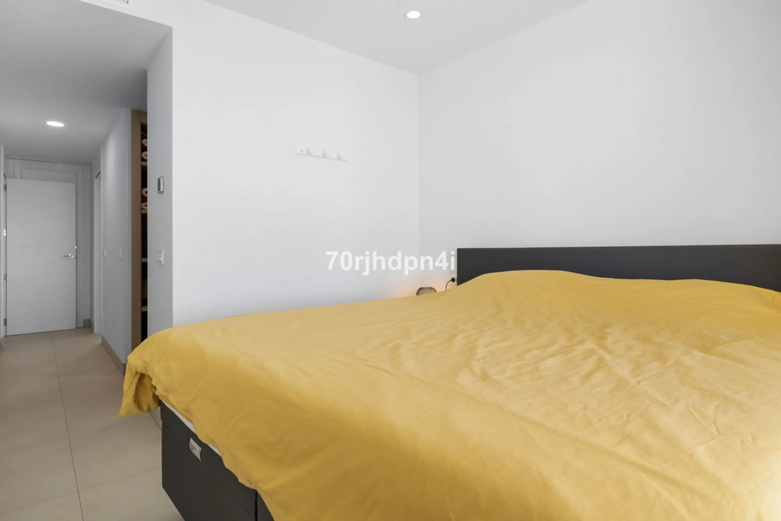 Modern first-floor apartment in ONE Residences, Calanova Golf, offering panoramic sea and golf views. South-facing with a spacious 40 m² terrace.