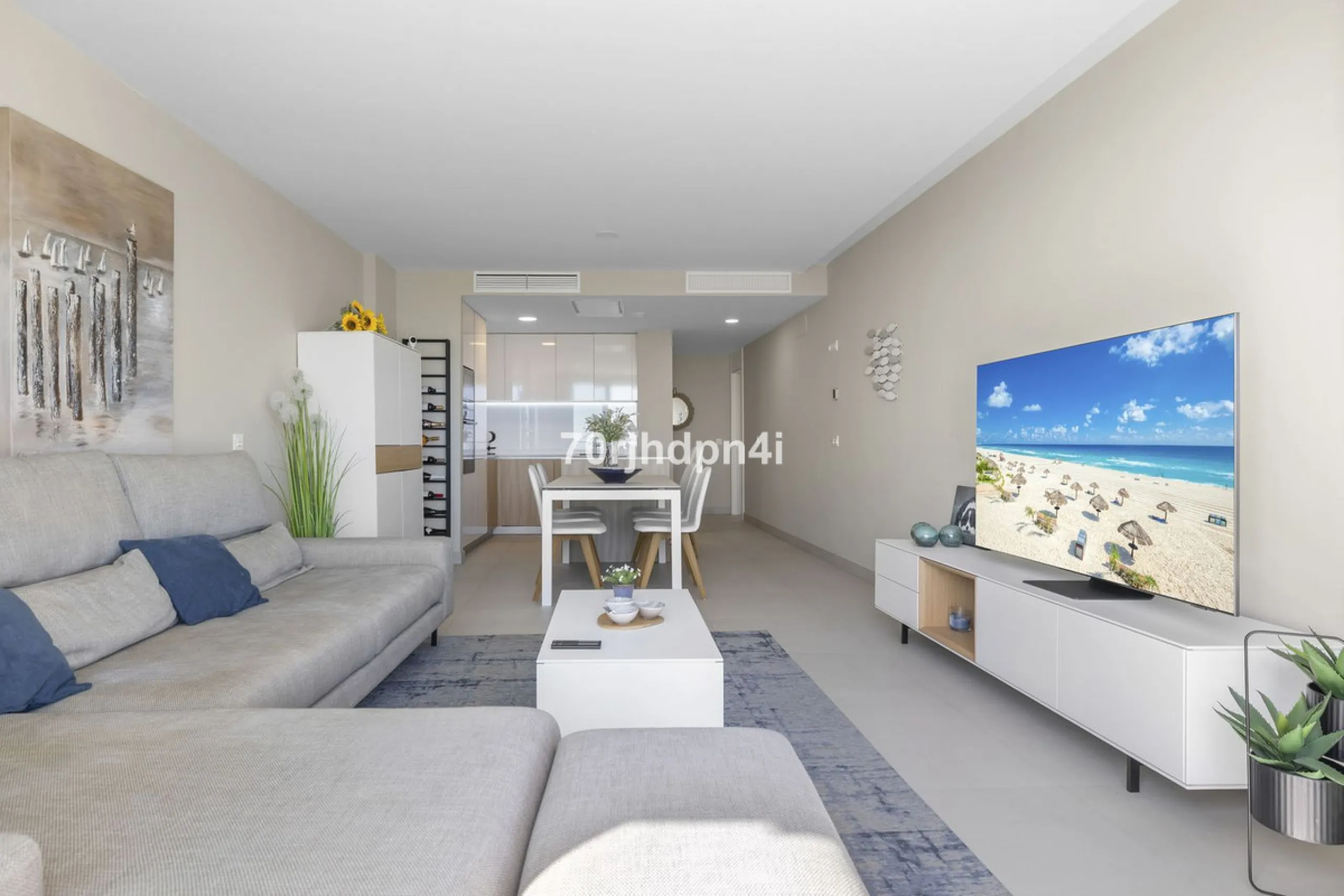 Modern first-floor apartment in ONE Residences, Calanova Golf, offering panoramic sea and golf views. South-facing with a spacious 40 m² terrace.