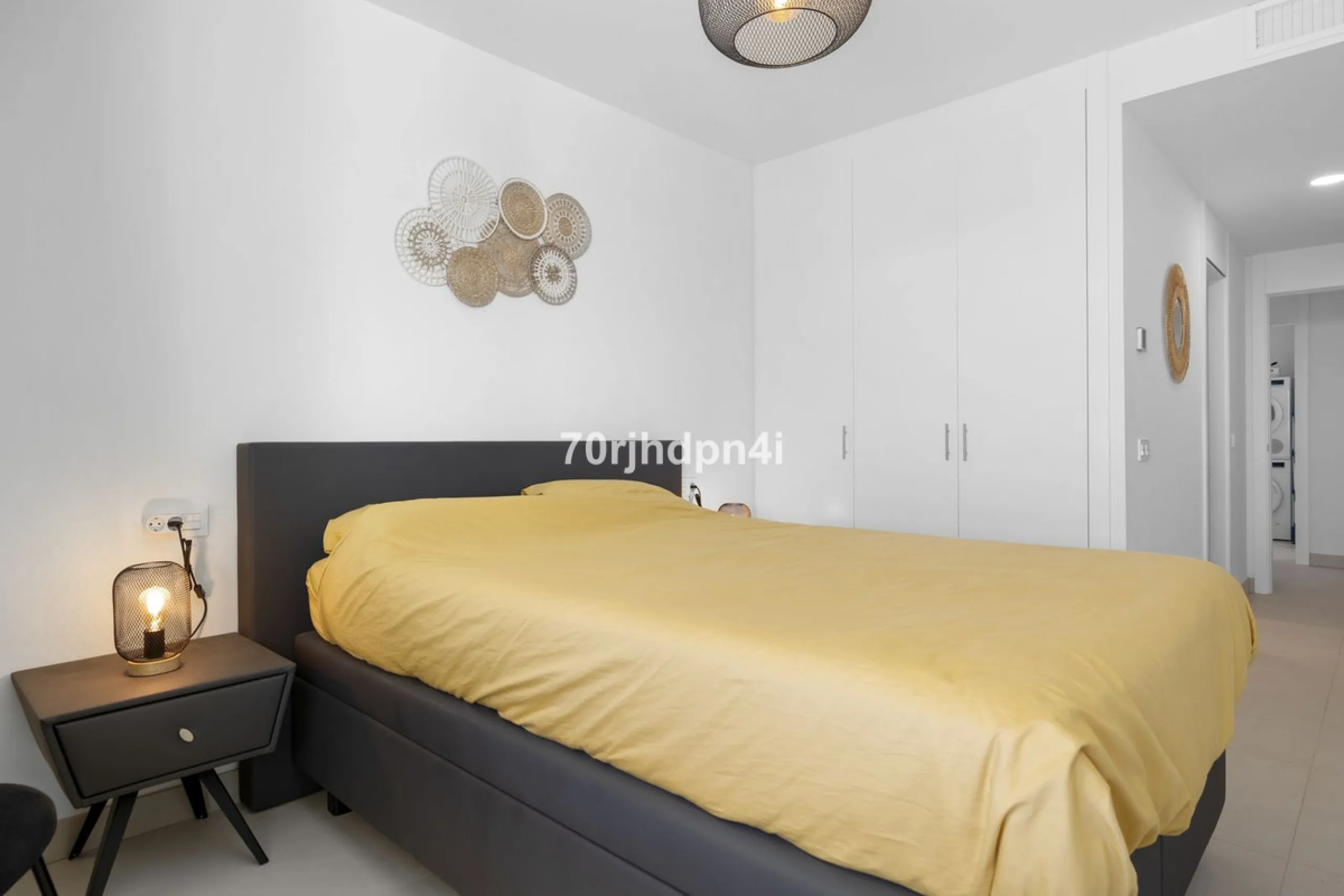 Modern first-floor apartment in ONE Residences, Calanova Golf, offering panoramic sea and golf views. South-facing with a spacious 40 m² terrace.